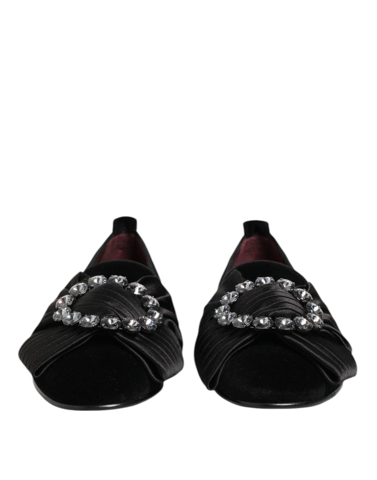 Experience the exquisite Dolce & Gabbana Black VATICANO Crystal Ribbon Slip On Shoes, crafted from sumptuous velvet, cotton, and leather, embodying timeless elegance and artisanal mastery.