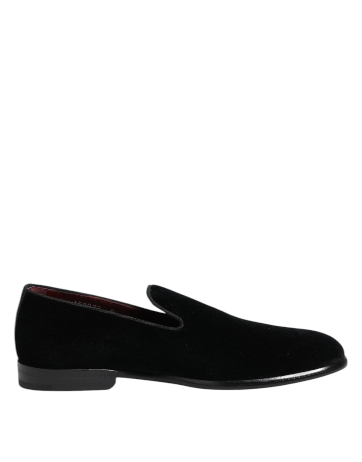 Indulge in the exquisite Dolce & Gabbana Black Velvet Loafers, where luxurious cotton meets Italian craftsmanship, embodying timeless elegance for the discerning connoisseur.