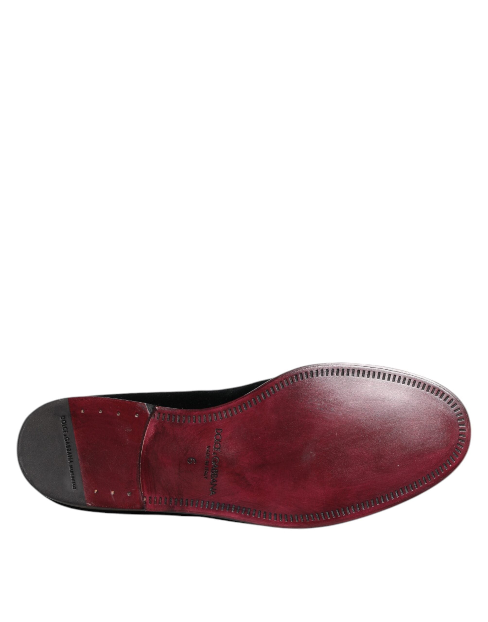 Indulge in the exquisite Dolce & Gabbana Black Velvet Loafers, where luxurious cotton meets Italian craftsmanship, embodying timeless elegance for the discerning individual.