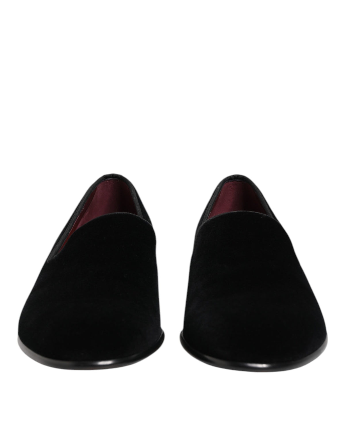 Step into sophistication with Dolce & Gabbana's Black Velvet Slip On Loafers, crafted in Italy for a luxurious touch that elevates any ensemble.