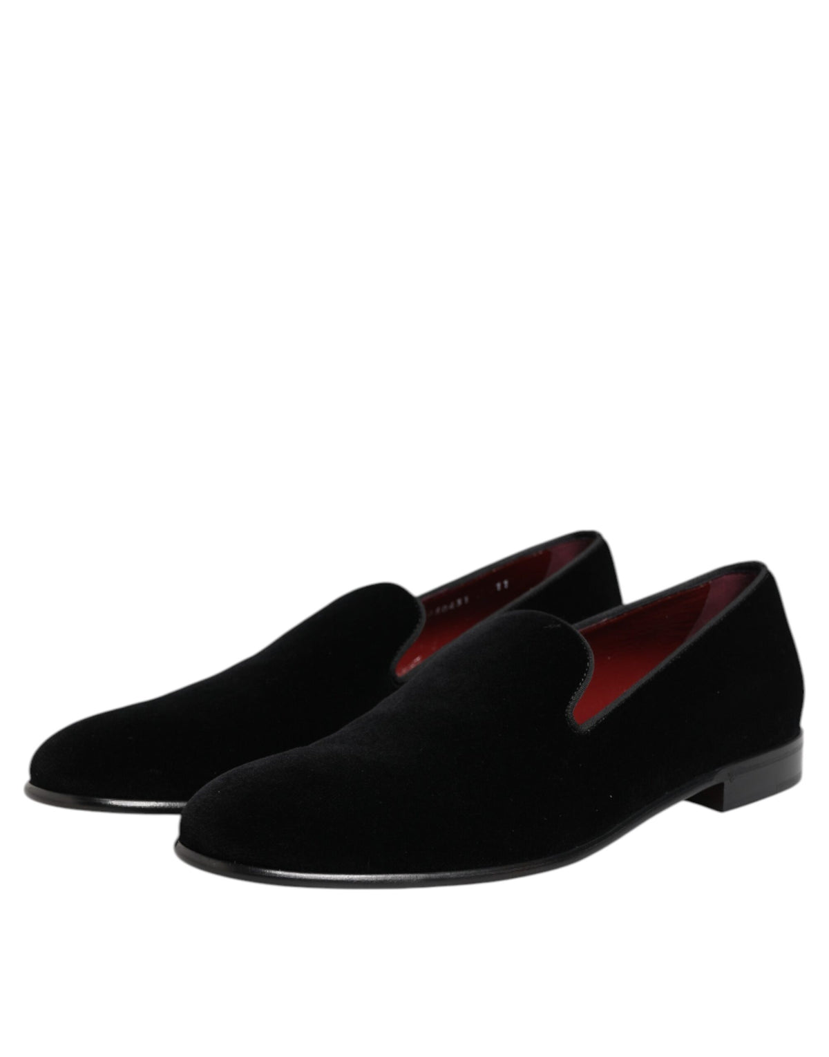 Step into sophistication with Dolce & Gabbana Black Velvet Slip On Loafers, where exquisite craftsmanship meets timeless elegance, perfect for the discerning individual.