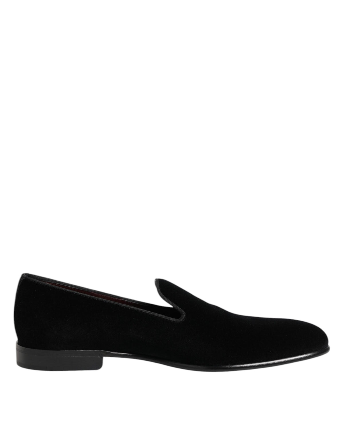 Step into a world of refined elegance with Dolce & Gabbana Black Velvet Slip On Loafers, crafted in Italy from sumptuous velvet for the discerning individual.