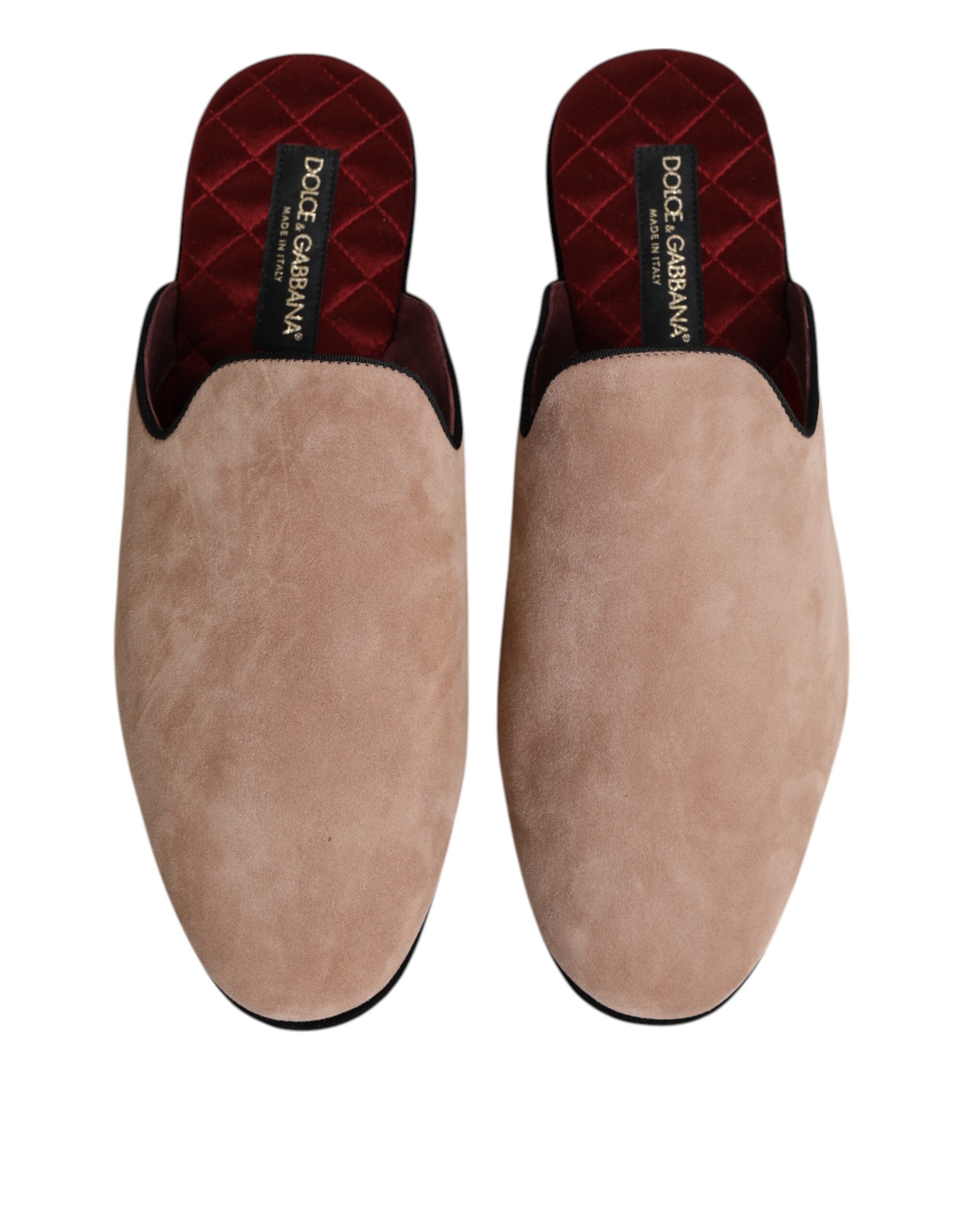Discover the elegance of Dolce & Gabbana's Beige Suede Leather Slides, crafted from luxurious Capra leather, embodying sophistication and timeless allure for every occasion.