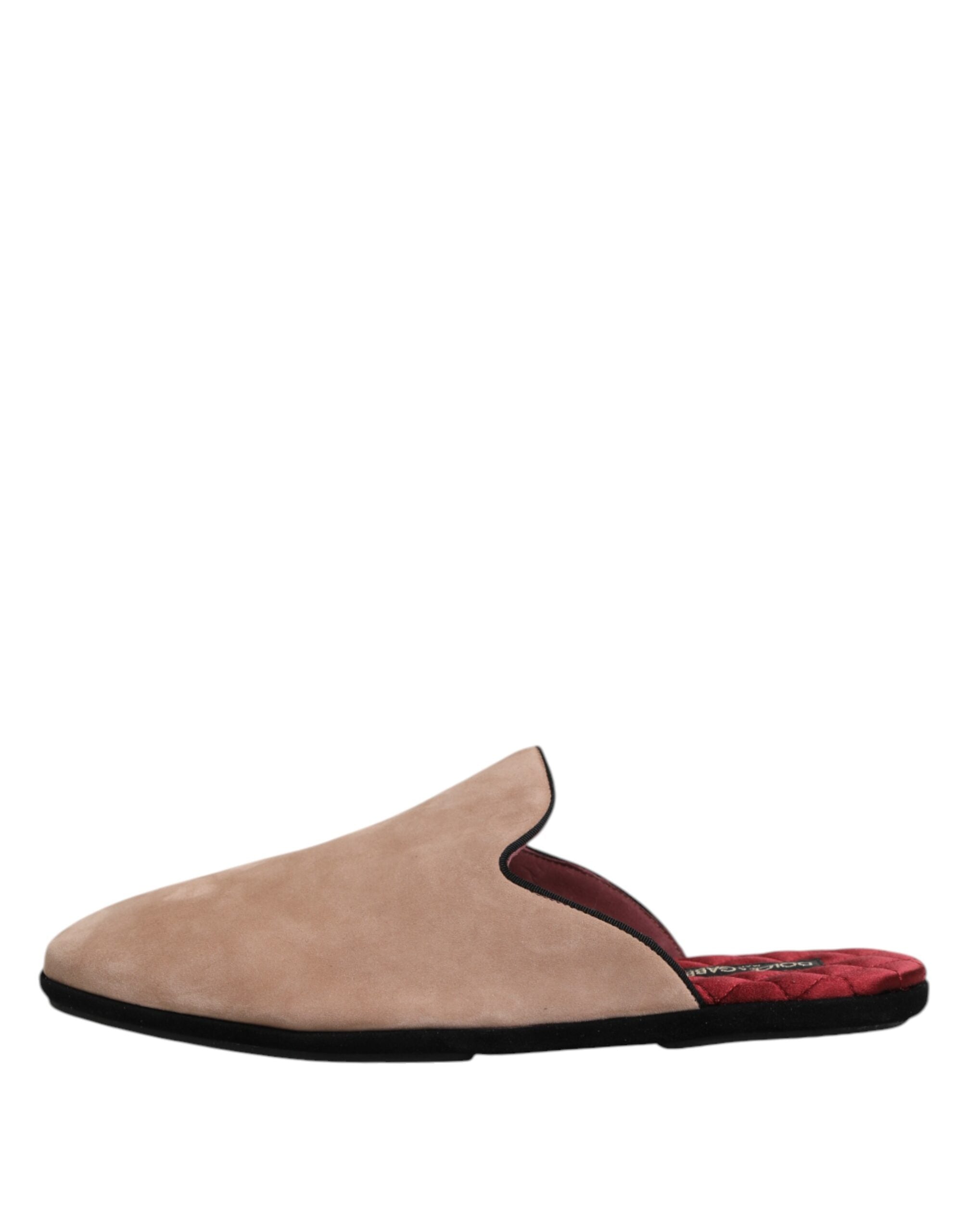 Experience the exquisite allure of Dolce & Gabbana's Beige Suede Leather Slides, crafted from luxurious Capra leather for effortless elegance and timeless sophistication.