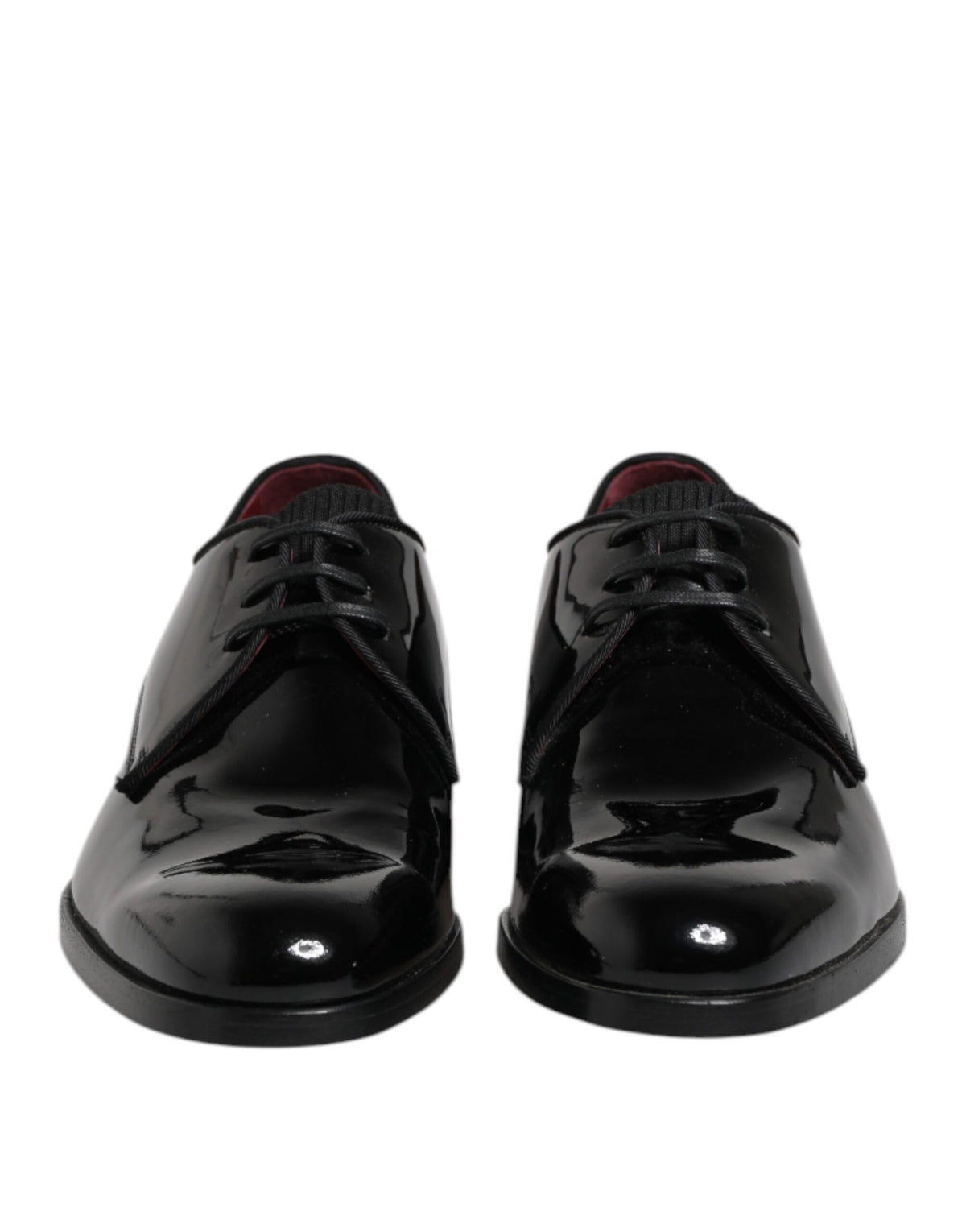 Indulge in the exquisite craftsmanship of Dolce & Gabbana's Black Leather Lace Up Derby Shoes, where luxurious calfskin meets timeless elegance for the discerning individual.