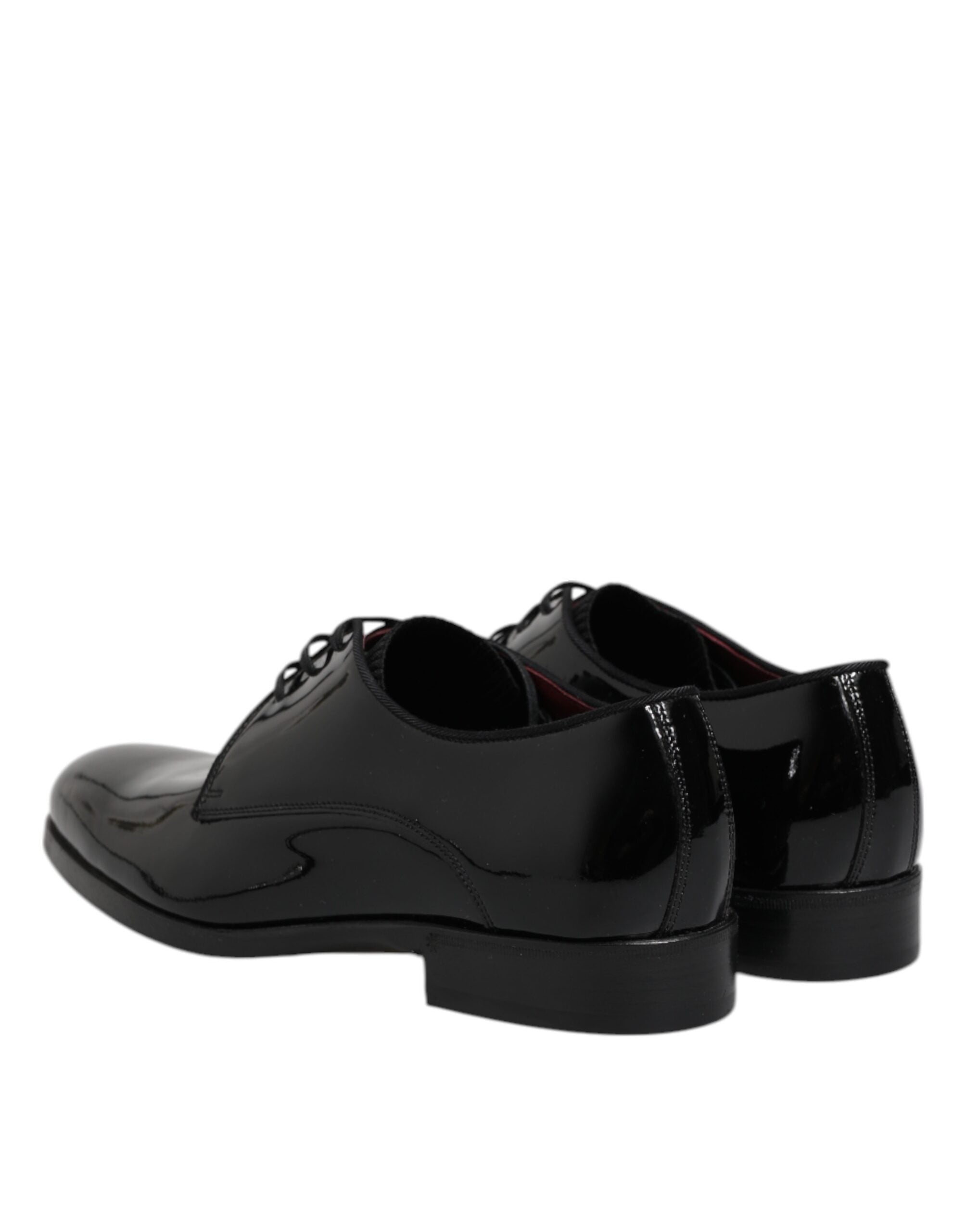 Step into the realm of elegance with Dolce & Gabbana's Black Leather Derby Shoes, crafted from exquisite calfskin leather, embodying timeless luxury and sophistication.