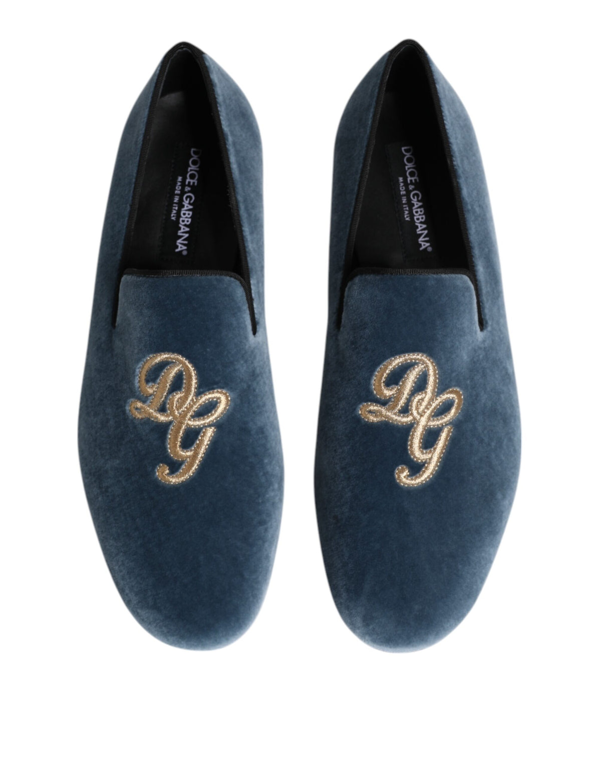 Indulge in the exquisite Dolce & Gabbana Blue Velvet DG Logo Loafers, where sumptuous velvet meets artisanal craftsmanship, embodying timeless elegance for the discerning individual.