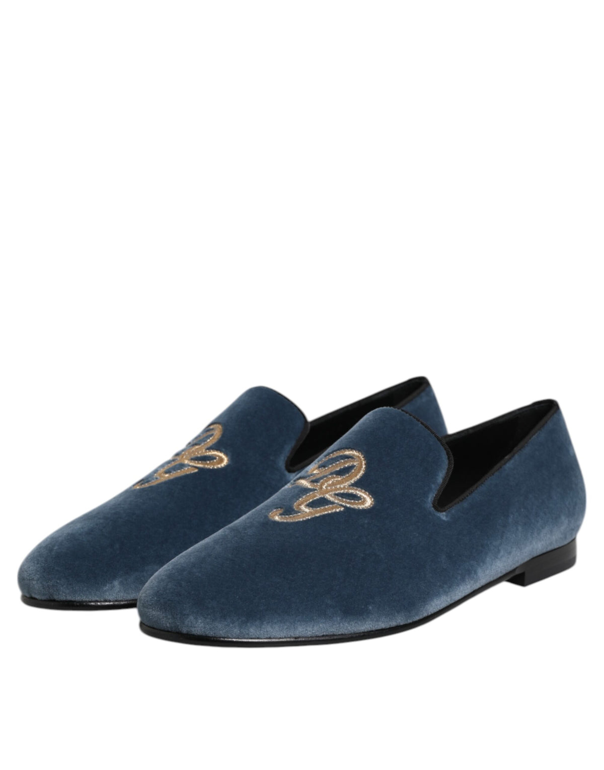 Indulge in the exquisite Dolce & Gabbana Blue Velvet DG Logo Loafers, where sumptuous velvet meets artisanal craftsmanship, elevating your elegance and confidence.