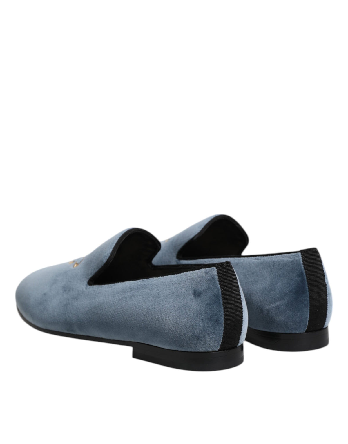Experience the exquisite Dolce & Gabbana Blue Velvet DG Logo Loafers, where sumptuous velvet meets artisanal craftsmanship, embodying timeless luxury and elegance.
