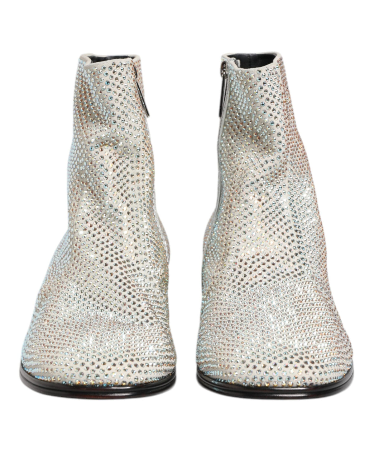 Step into a realm of elegance with Dolce & Gabbana's White Strass DG Logo Heels, where exquisite leather and crystal detailing embody timeless luxury and sophisticated allure.