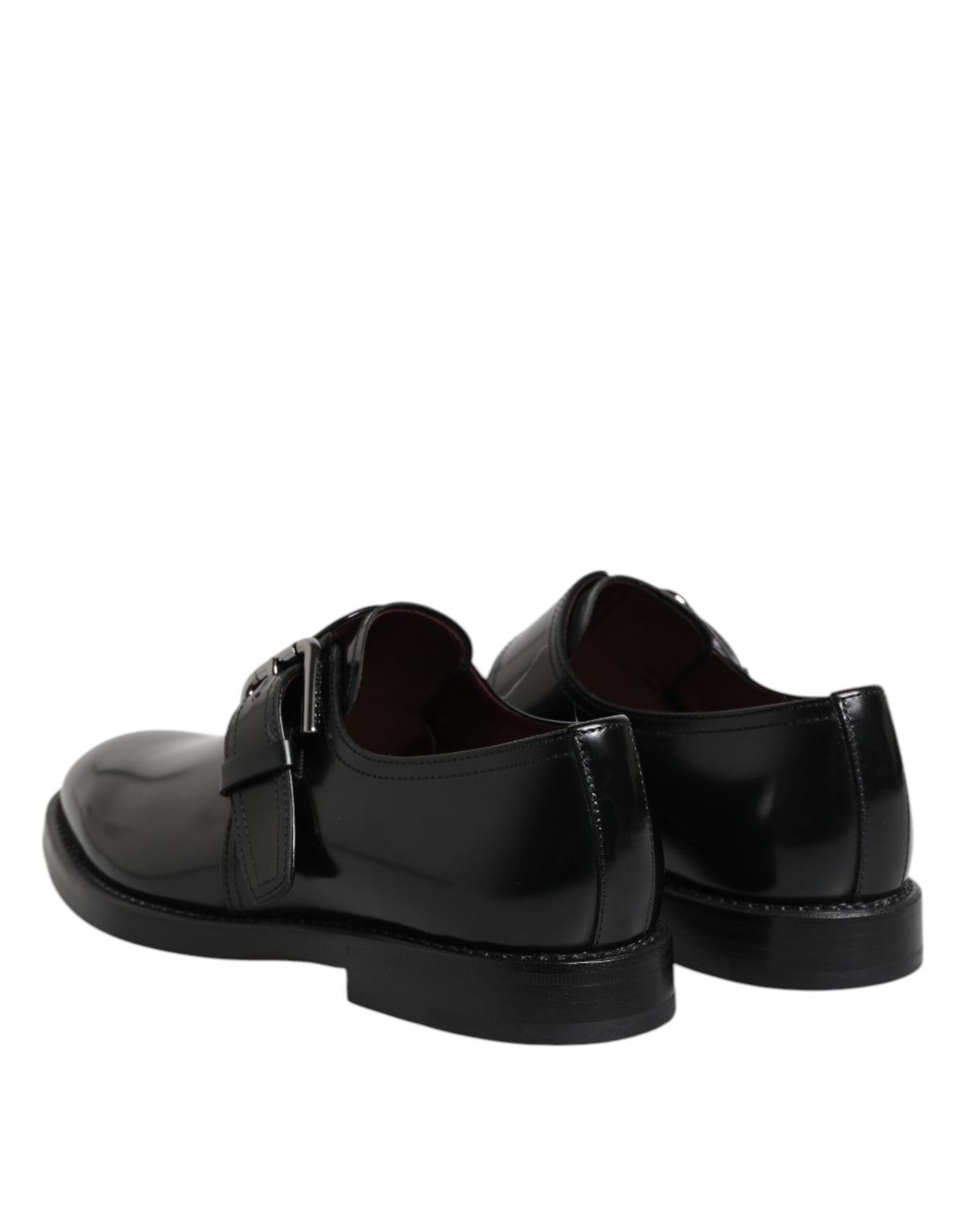 Indulge in the exquisite craftsmanship of Dolce & Gabbana's Black Leather Monk Strap Derby Formal Shoes, where timeless elegance meets luxurious sophistication for the discerning individual.