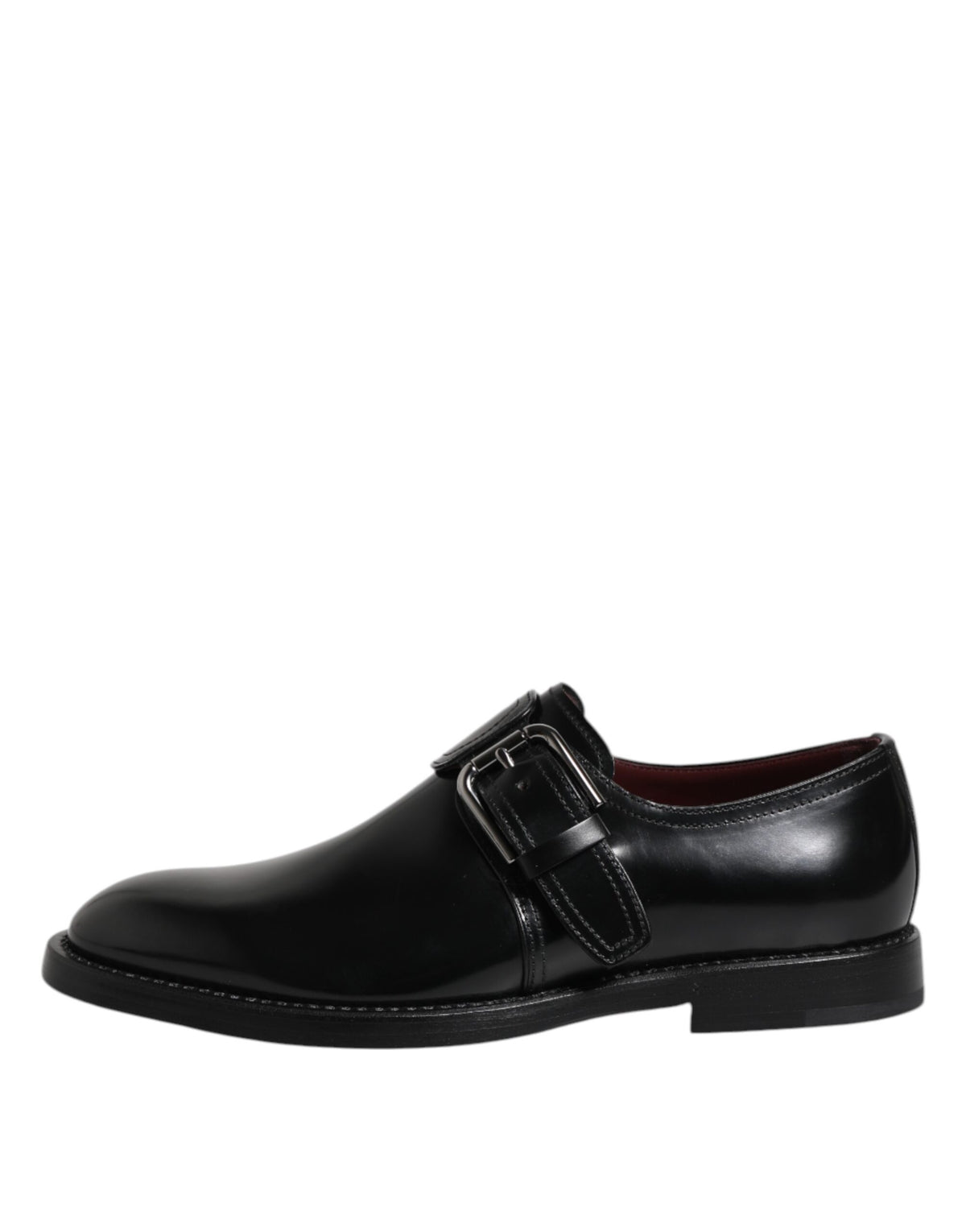 Indulge in the exquisite craftsmanship of Dolce & Gabbana's Black Leather Monk Strap Derby Formal Shoes, where timeless elegance meets unparalleled luxury for discerning tastes.