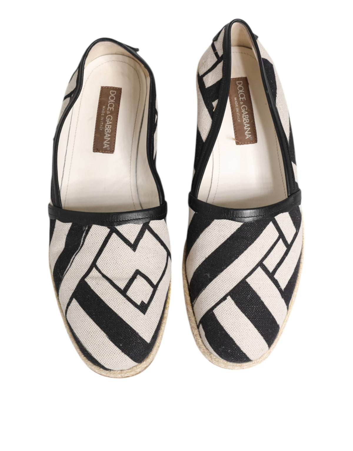 Experience the exquisite Dolce & Gabbana Black White Stripes Flat Espadrille Shoes, where artisanal craftsmanship meets luxurious comfort, perfect for the discerning individual.