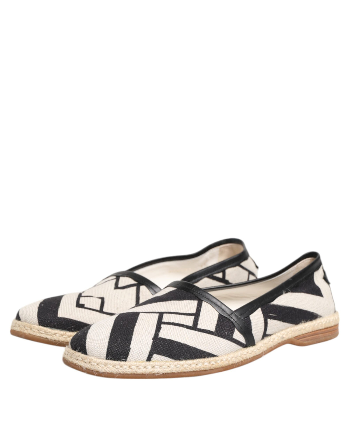 Indulge in the exquisite Dolce & Gabbana Black White Stripes Flat Espadrille Shoes, where Italian craftsmanship meets luxurious comfort, perfect for every elegant occasion.