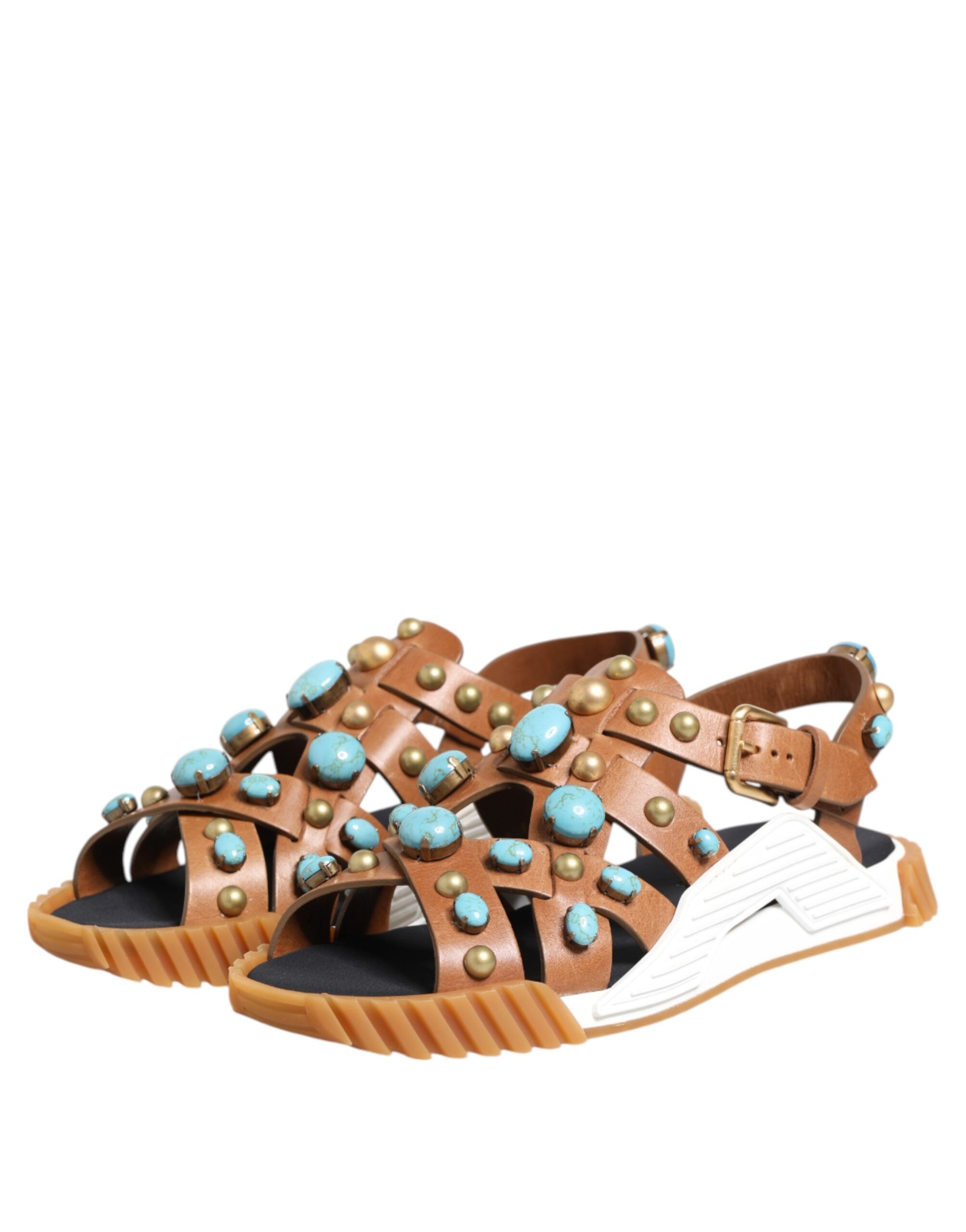 Indulge in the exquisite Dolce & Gabbana Brown Leather Studded Slides, where luxurious craftsmanship meets timeless elegance, perfect for the discerning individual.