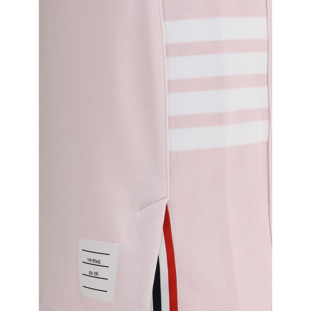 Indulge in the Thom Browne Multicolor Cotton Mini Skirt, a masterpiece of 100% cotton craftsmanship, embodying timeless elegance and effortless sophistication for the discerning individual.