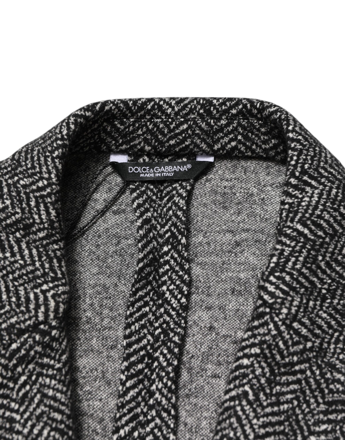 Elevate your wardrobe with the Dolce & Gabbana Black White Double Breasted Men Suit Blazer, a masterpiece of Italian craftsmanship in luxurious wool and cotton.