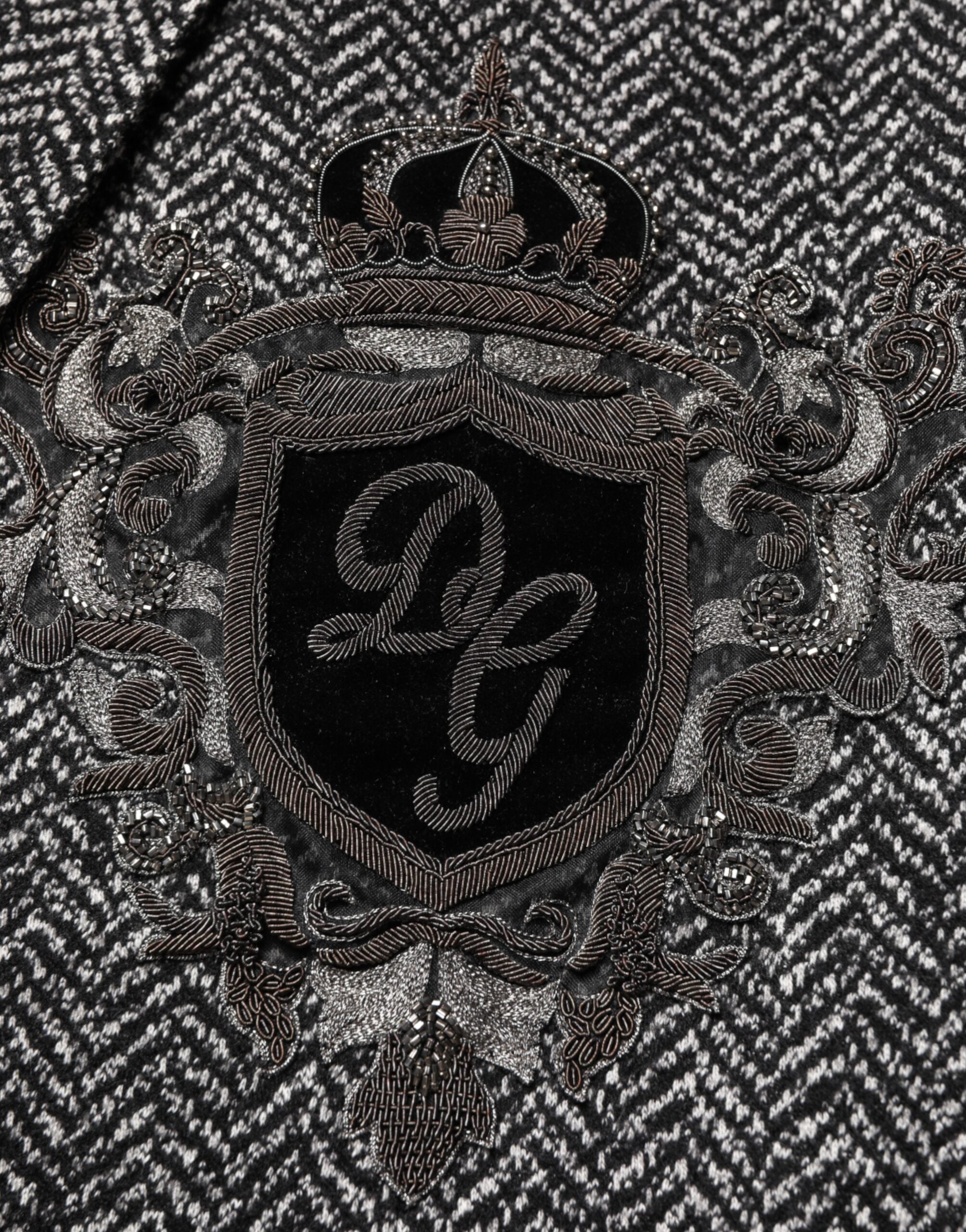 Discover the Dolce & Gabbana Black White Double Breasted Men Suit Blazer, a masterful blend of wool and cotton, embodying timeless elegance and Italian craftsmanship for the discerning individual.