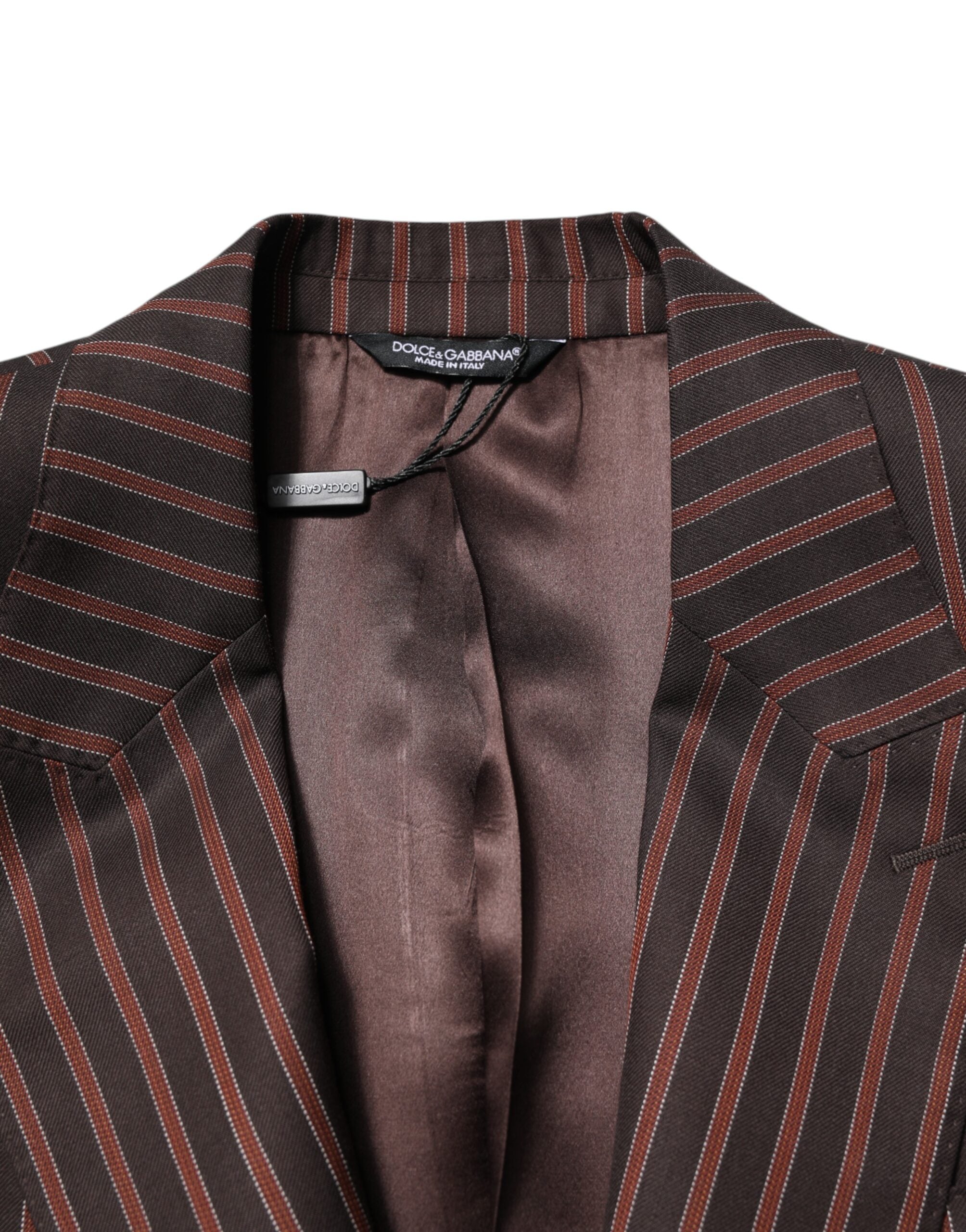 Elevate your wardrobe with the Dolce & Gabbana Black Brown Stripe Single Breasted Blazer, crafted from luxurious virgin wool and silk lining, epitomizing timeless elegance and exquisite craftsmanship.