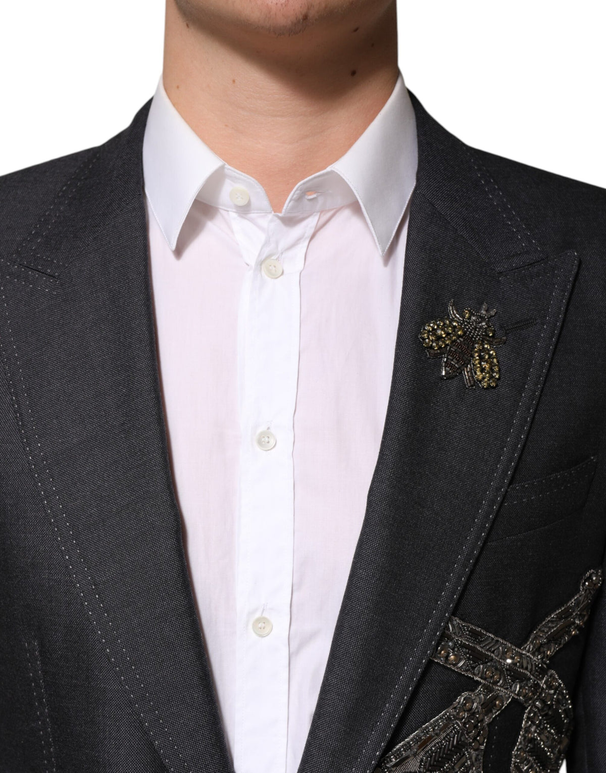 Indulge in the exquisite Dolce & Gabbana Dark Gray Bee Embroidery Wool Coat Blazer, where luxurious materials and meticulous craftsmanship redefine sophistication for the discerning individual.