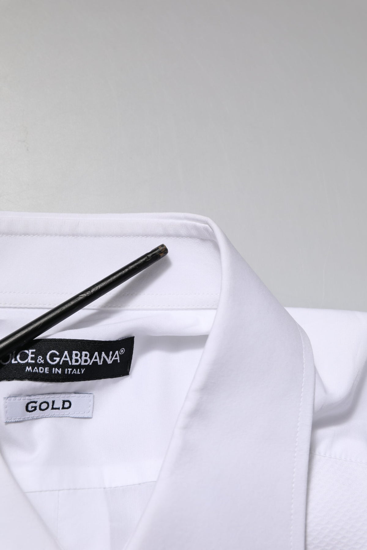 Elevate your wardrobe with the Dolce & Gabbana White Bib Cotton Poplin GOLD Men Formal Shirt, a masterpiece of Italian craftsmanship in luxurious cotton, perfect for discerning tastes.