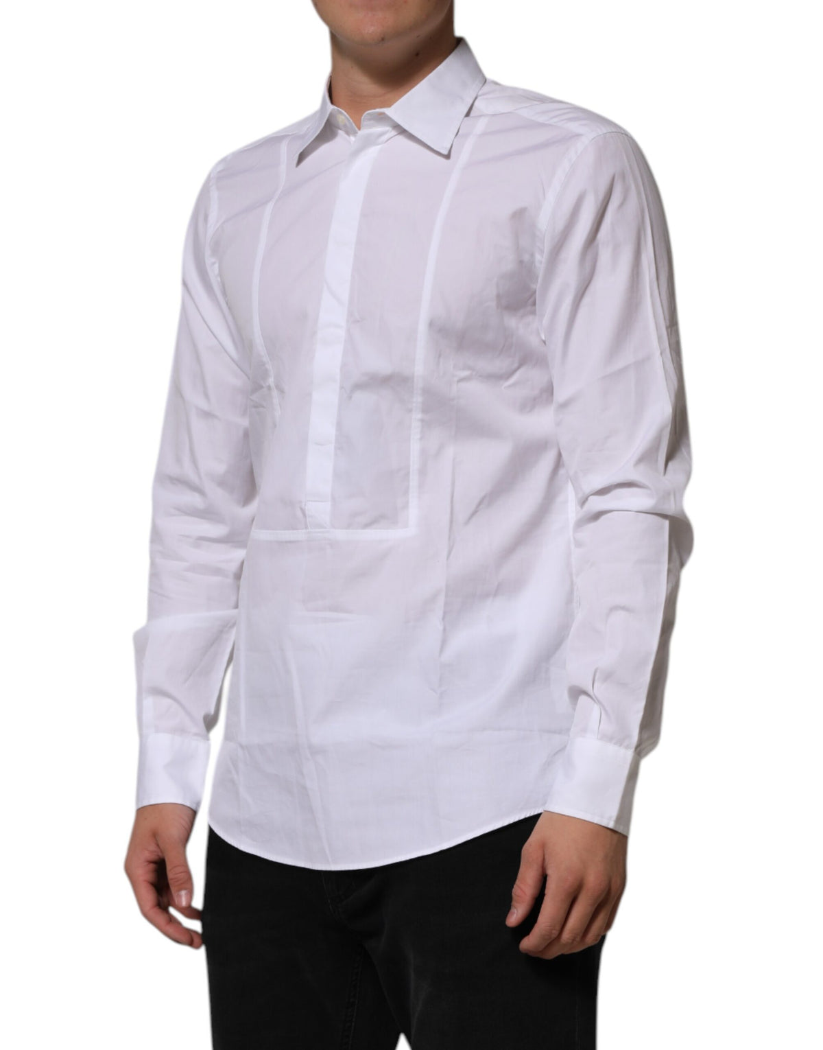 Indulge in the timeless elegance of the Dolce & Gabbana White Poplin Cotton Formal Dress Shirt, a luxurious blend of sophistication and comfort for discerning individuals.