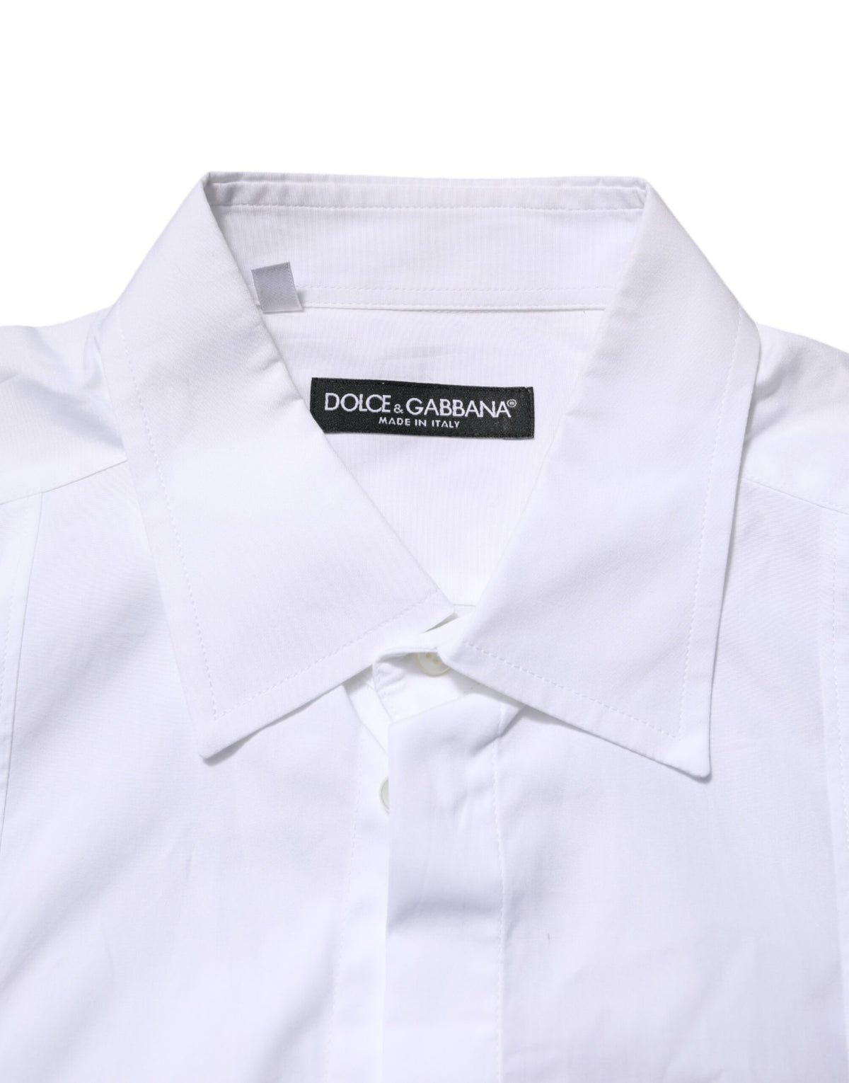Discover the Dolce & Gabbana White Poplin Cotton Formal Dress Shirt, a masterpiece of Italian craftsmanship that embodies timeless elegance for the discerning individual.