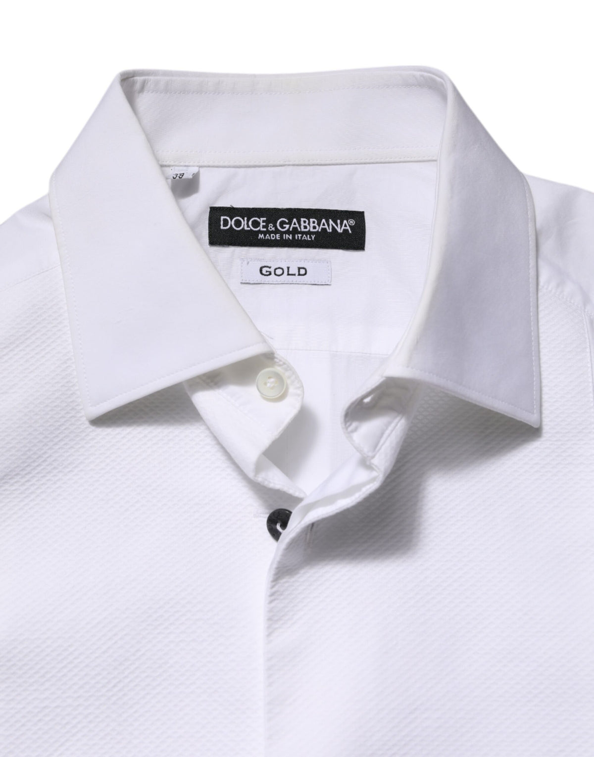 Elevate your wardrobe with the Dolce & Gabbana White Bib Cotton Poplin GOLD shirt, a masterpiece of Italian craftsmanship that embodies timeless elegance and refined sophistication.