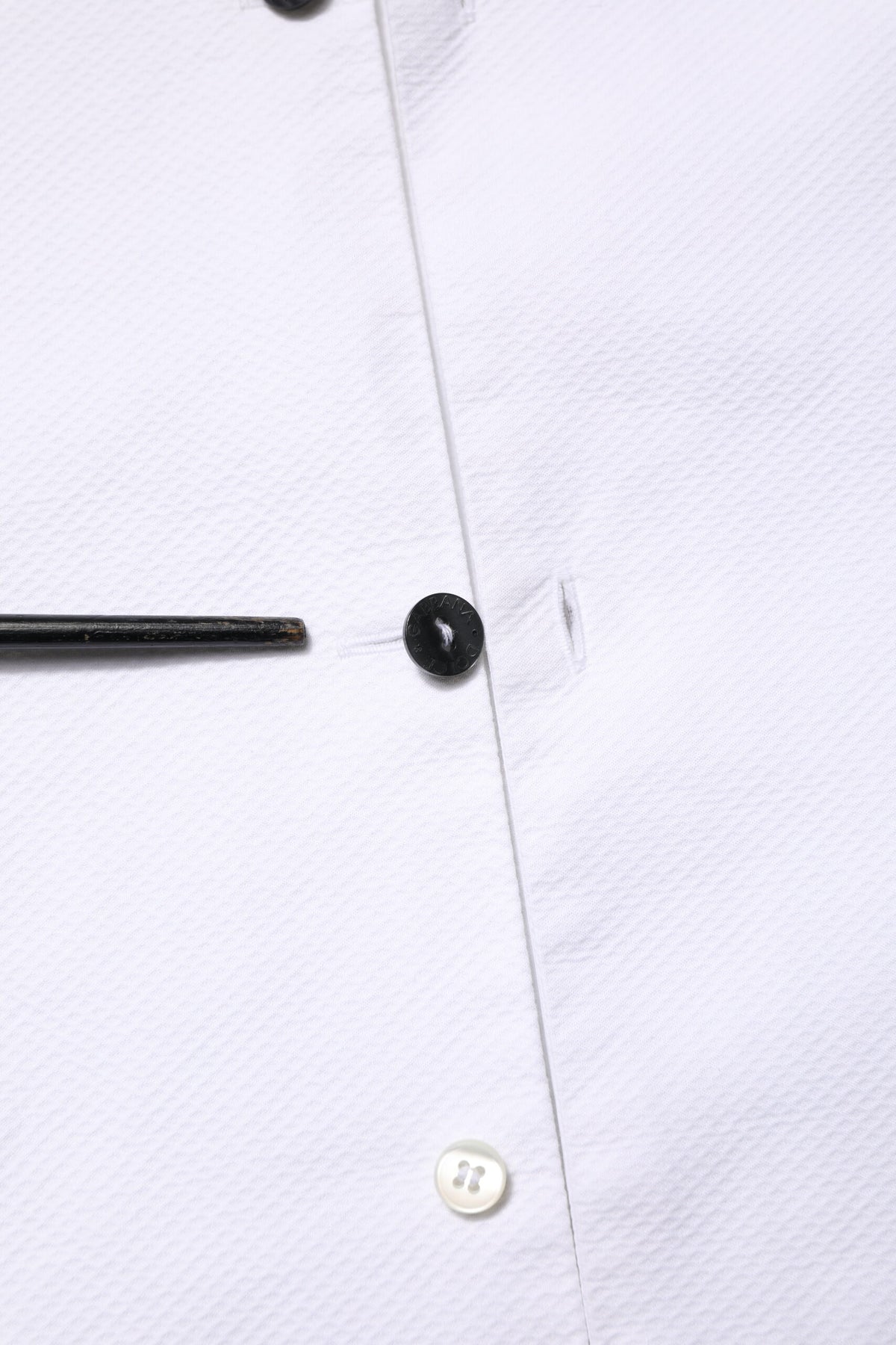 Discover the Dolce & Gabbana White Bib Cotton Poplin GOLD shirt, a masterpiece of Italian craftsmanship, embodying timeless elegance and refined luxury for the discerning individual.