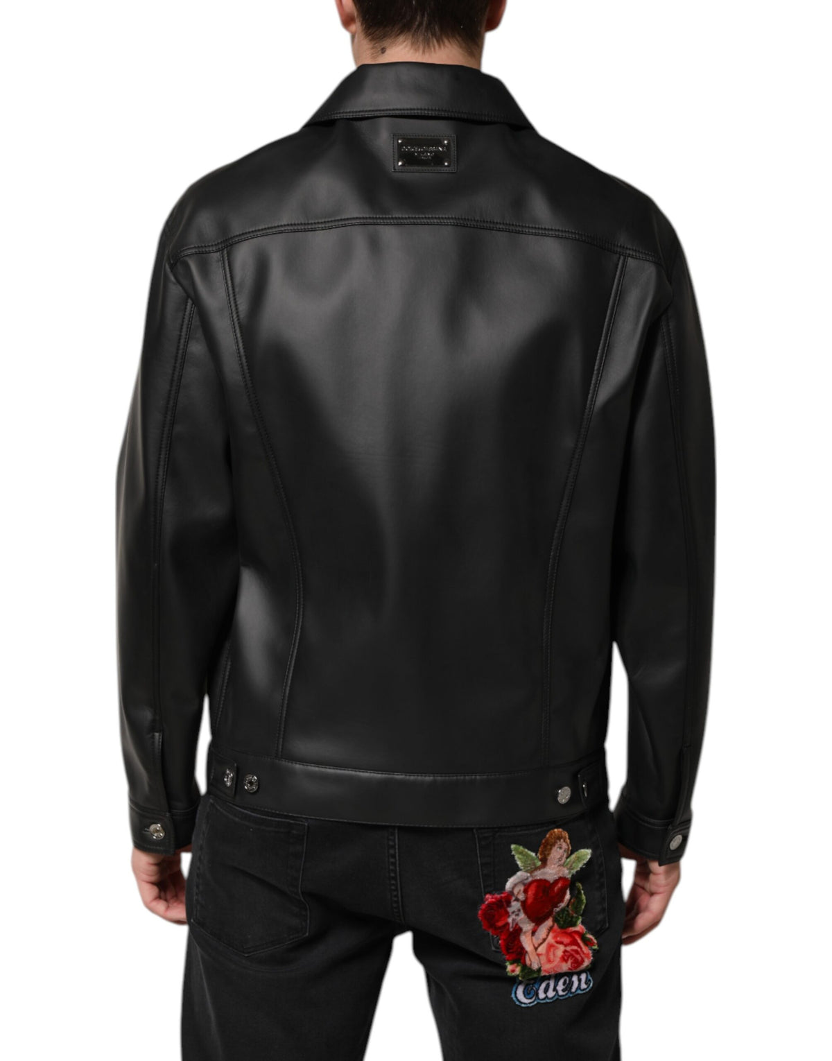 Discover the Dolce & Gabbana Black Polyester Button Down Biker Jacket, a masterpiece of Italian craftsmanship that redefines elegance and sophistication for the discerning individual.