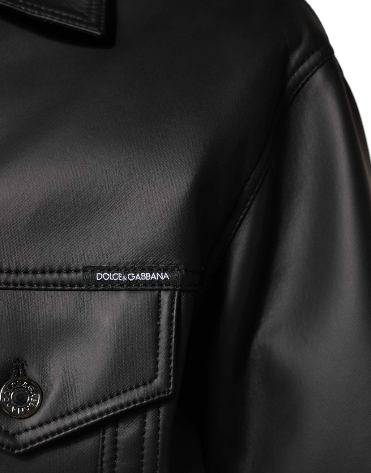 Discover the Dolce & Gabbana Black Polyester Button Down Biker Jacket, where exquisite Italian craftsmanship meets timeless elegance, perfect for the discerning individual.
