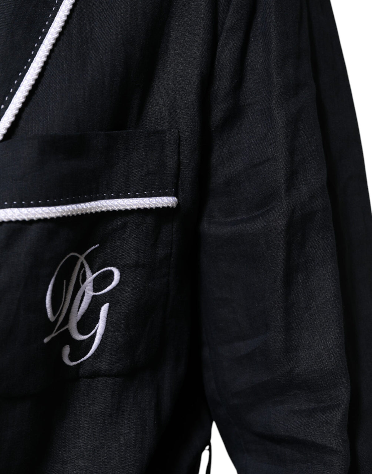 Elevate your wardrobe with the Dolce & Gabbana Dark Blue DG Embroidery Jacket Robe Blazer, a luxurious 100% linen masterpiece embodying timeless elegance and exquisite craftsmanship.