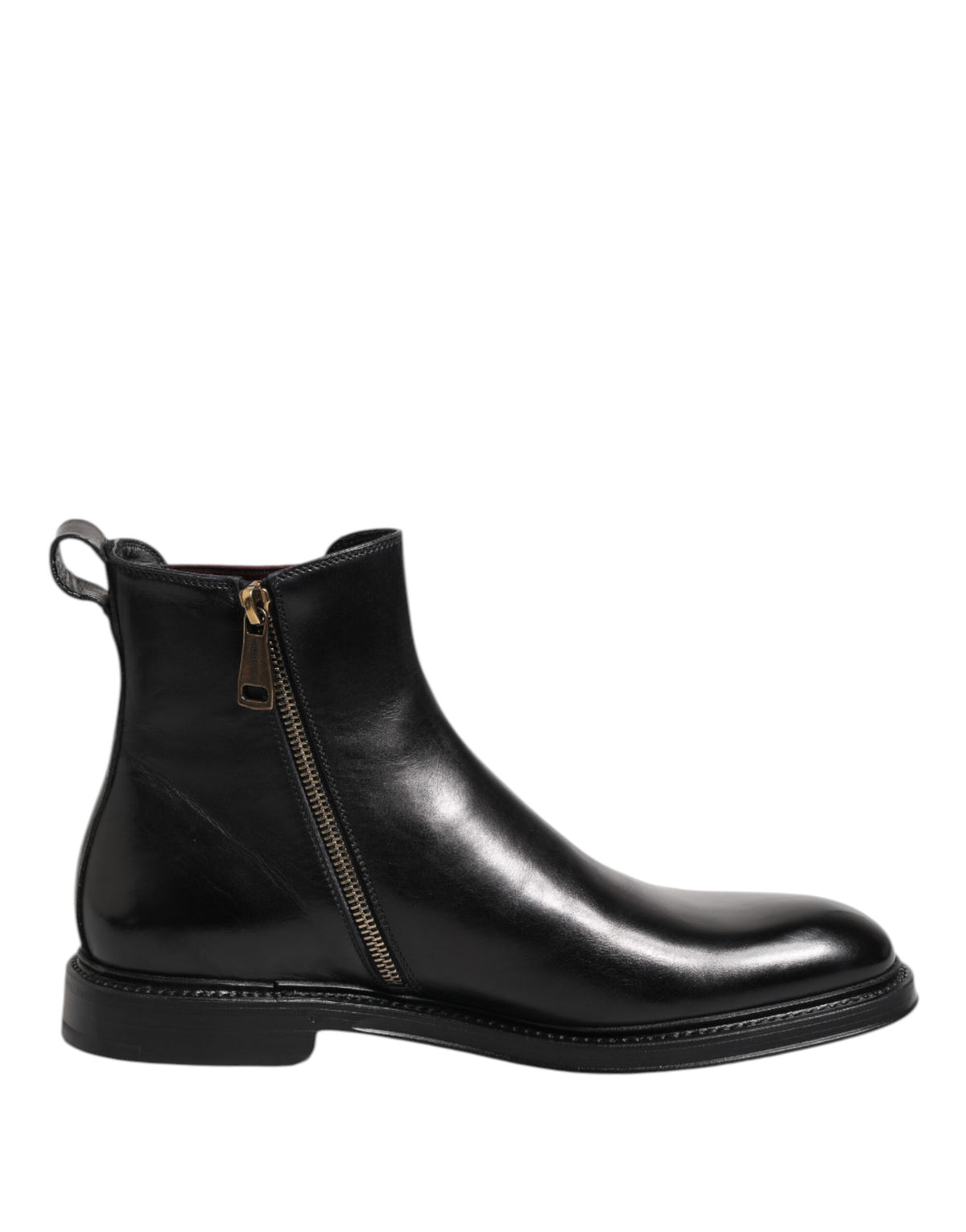 Indulge in the exquisite craftsmanship of Dolce & Gabbana's Black Chelsea Leather Mid Calf Boots, where timeless elegance meets modern sophistication for the discerning individual.