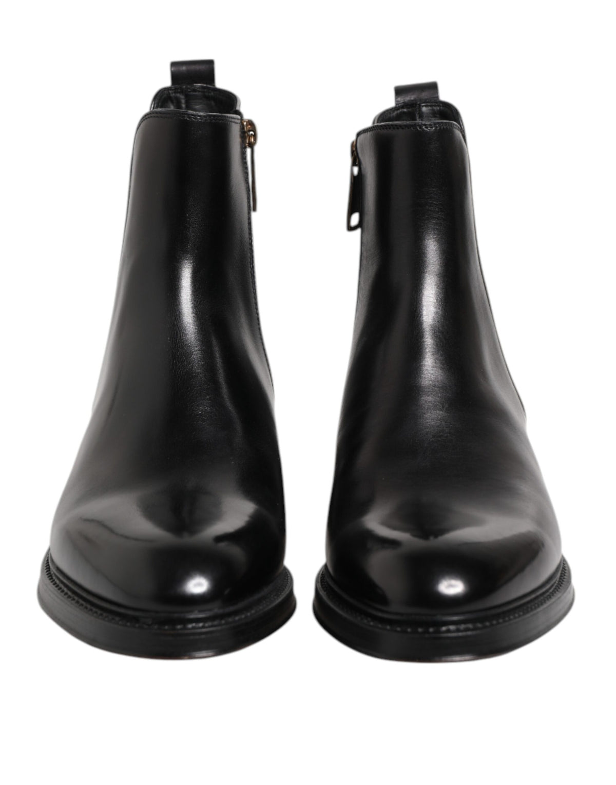Step into a realm of elegance with Dolce & Gabbana Black Chelsea Leather Mid Calf Boots, crafted in Italy from luxurious materials for the discerning individual.