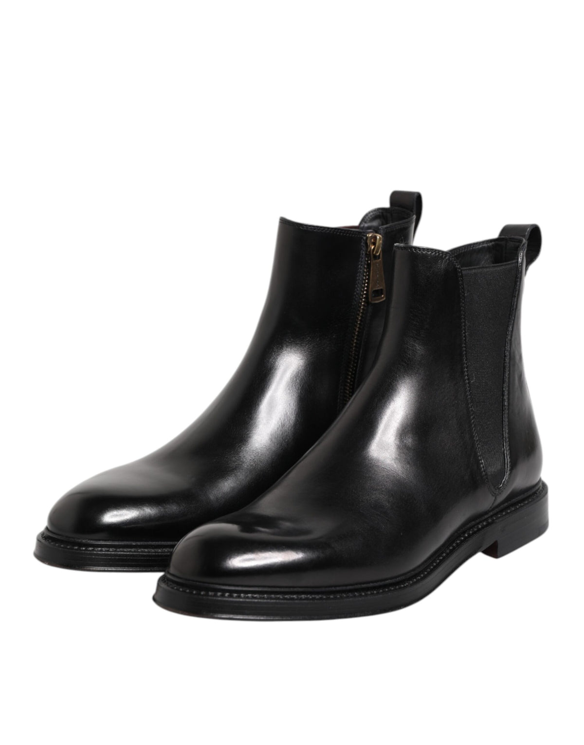 Step into a realm of elegance with Dolce & Gabbana Black Chelsea Leather Mid Calf Boots, where exquisite craftsmanship meets luxurious materials for the discerning individual.