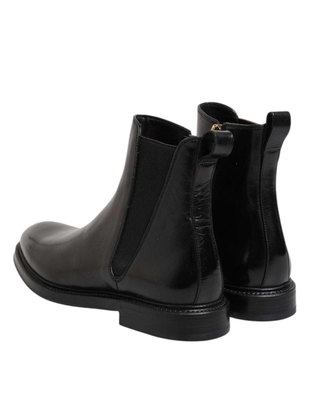 Step into a realm of sophistication with Dolce & Gabbana's Black Chelsea Leather Mid Calf Boots, crafted in Italy from premium materials for the discerning individual.
