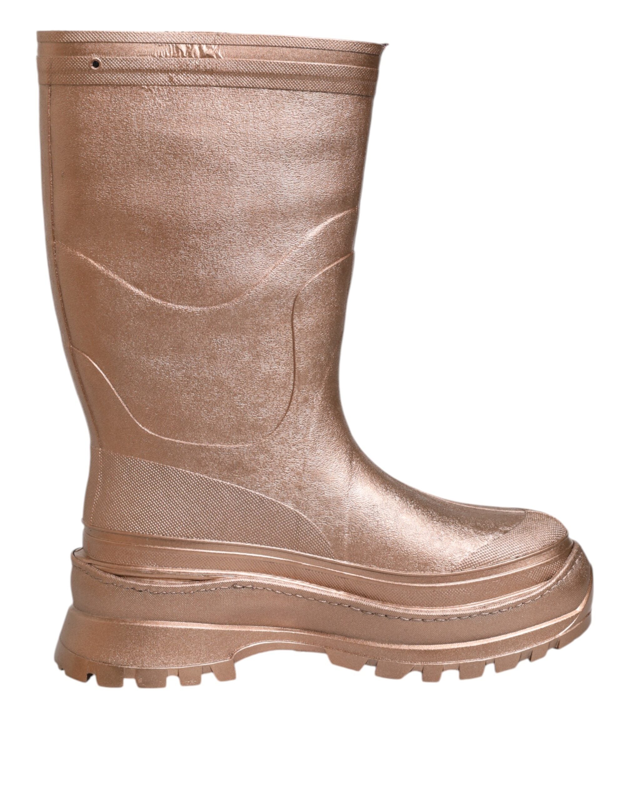 Step into unparalleled elegance with Dolce & Gabbana's Metallic Gold Pull On Rain Boots, crafted from premium rubber, embodying luxury and sophistication for every occasion.