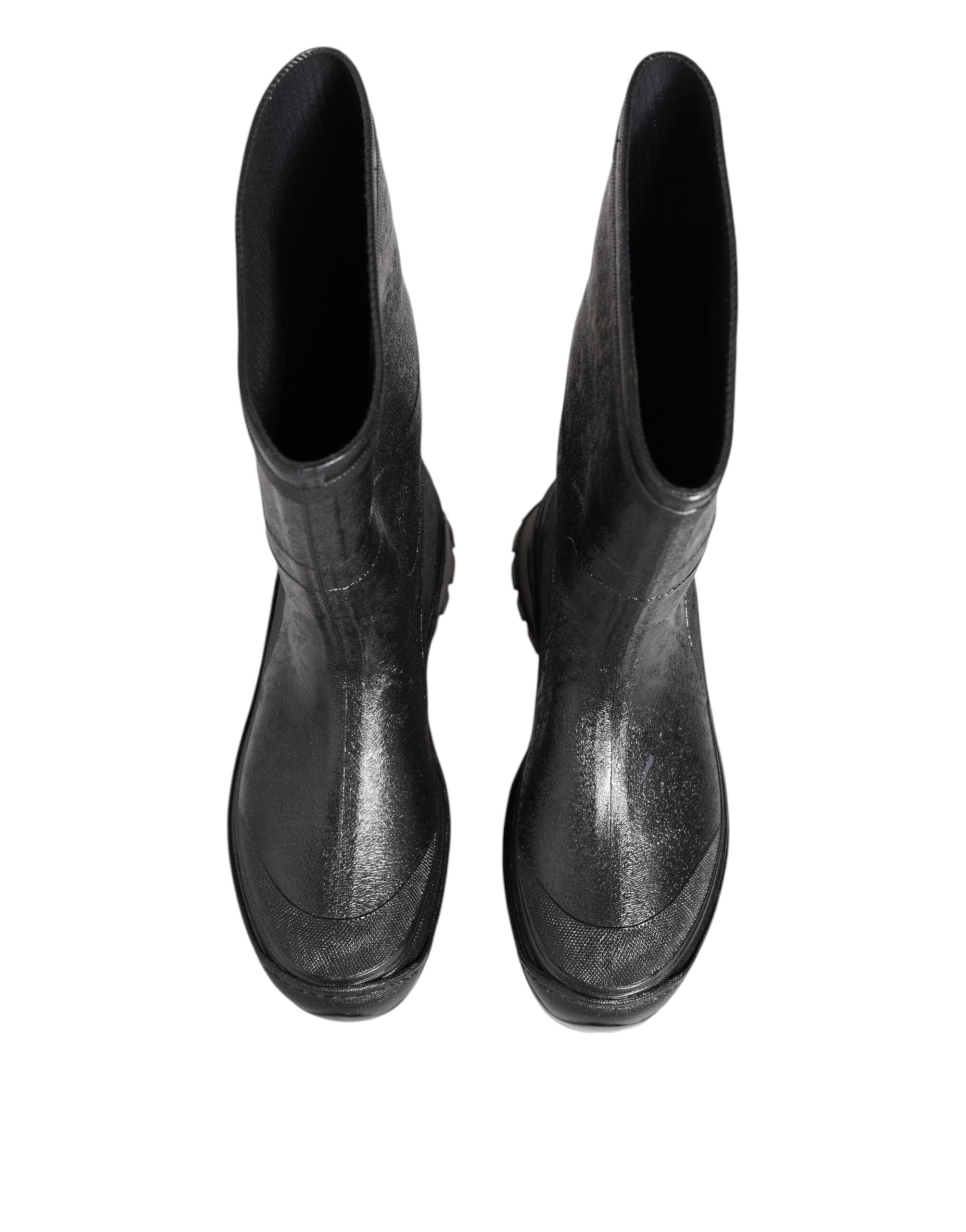 Experience the allure of Dolce & Gabbana's Metallic Black Pull On Rain Boots, crafted from authentic rubber for unparalleled elegance in every step.