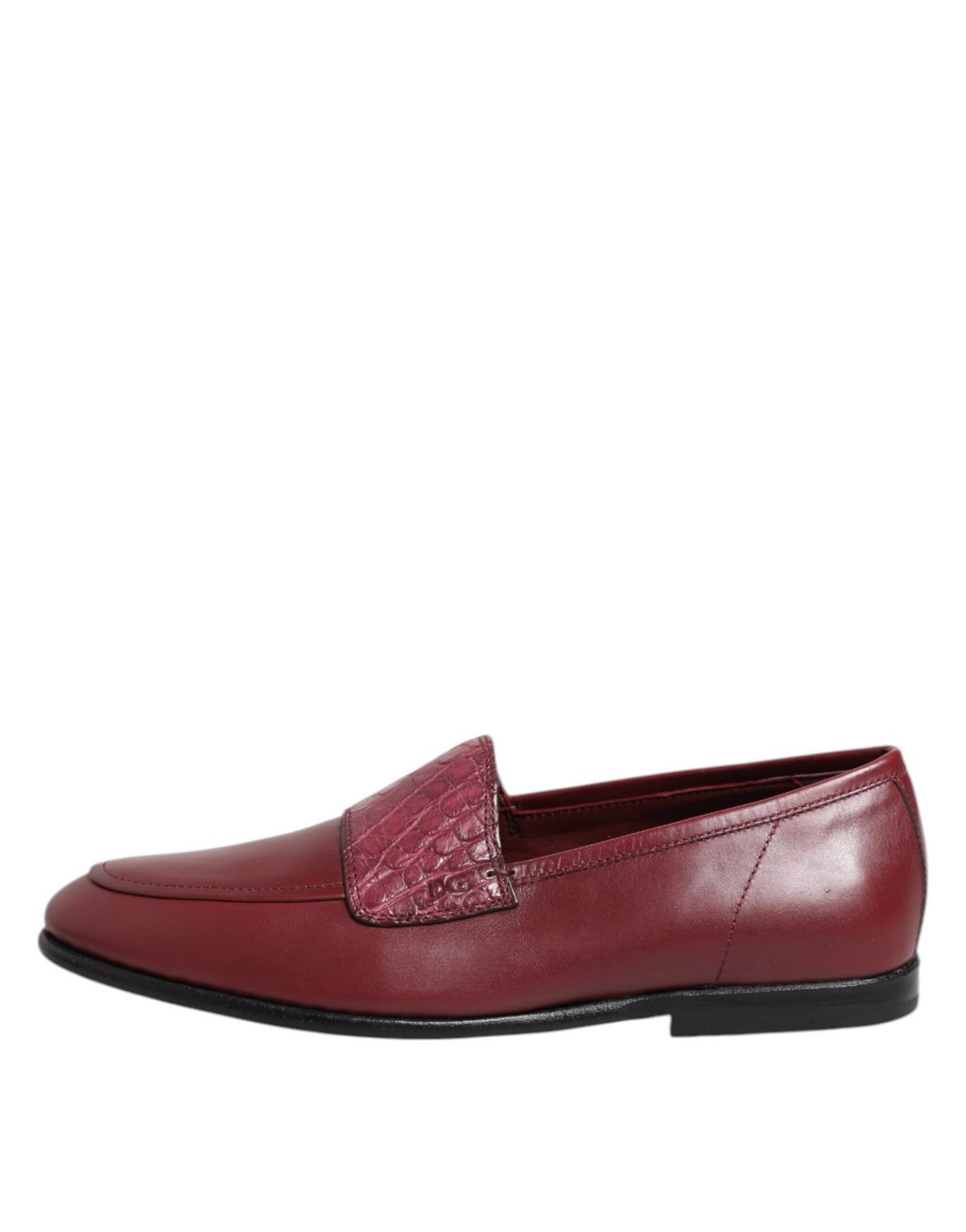 Indulge in the exquisite allure of Dolce & Gabbana's Burgundy Leather Formal Slip On Shoes, where luxurious calfskin and caiman leather meet timeless elegance for the discerning individual.