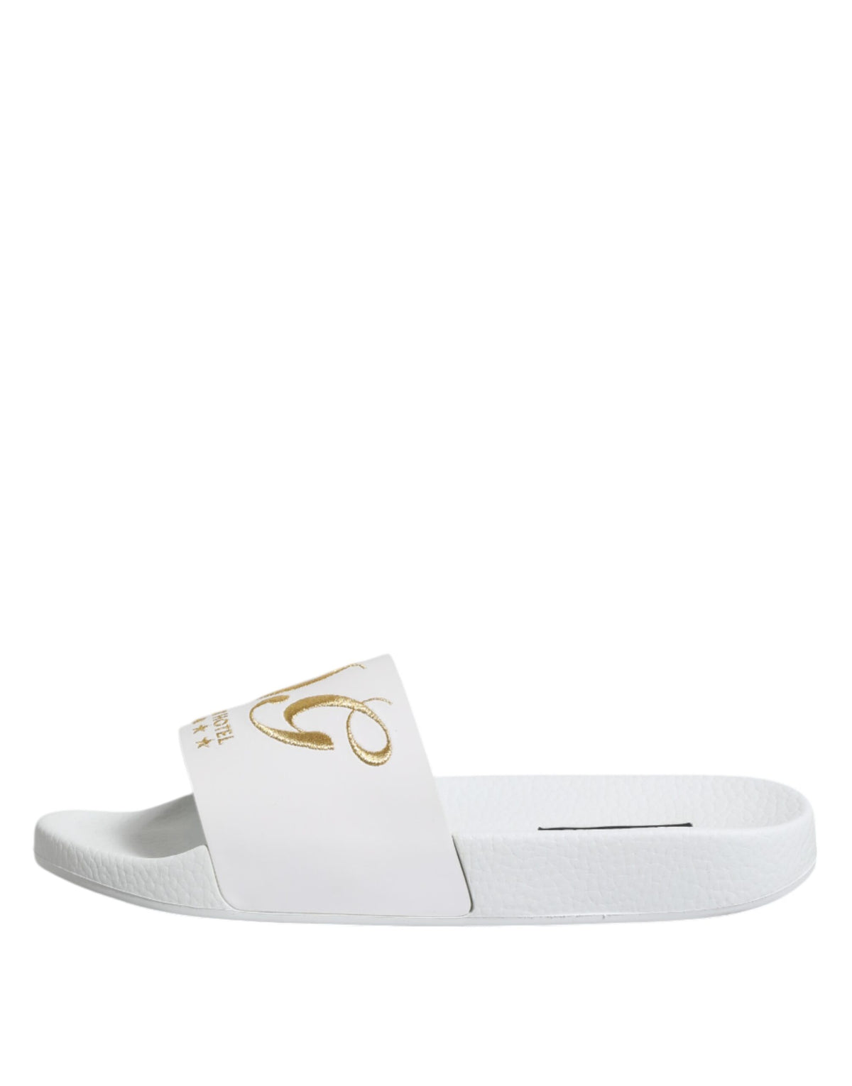 Elevate your beachwear with the Dolce & Gabbana White Leather Slides, crafted from exquisite calfskin leather, embodying luxury and sophistication for discerning tastes.