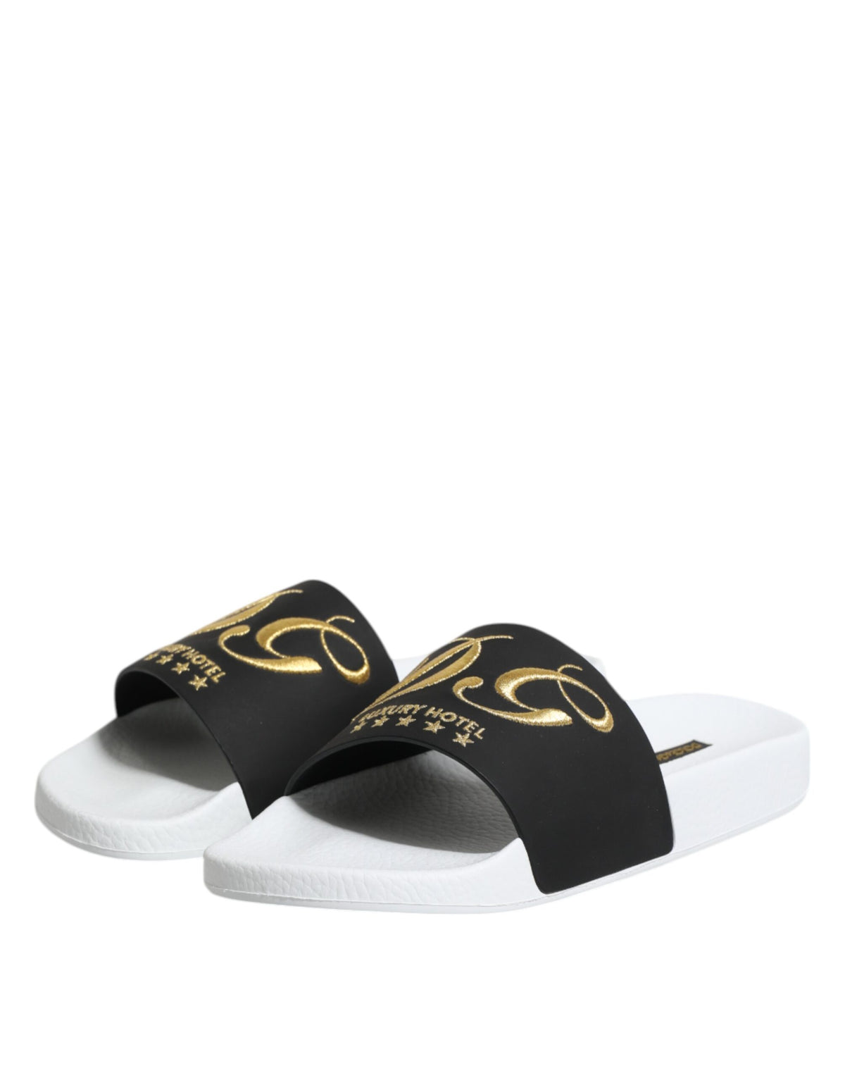 Indulge in the exquisite Dolce & Gabbana White Black Leather Sandals, crafted from luxurious calfskin for effortless elegance and unparalleled comfort, perfect for every occasion.