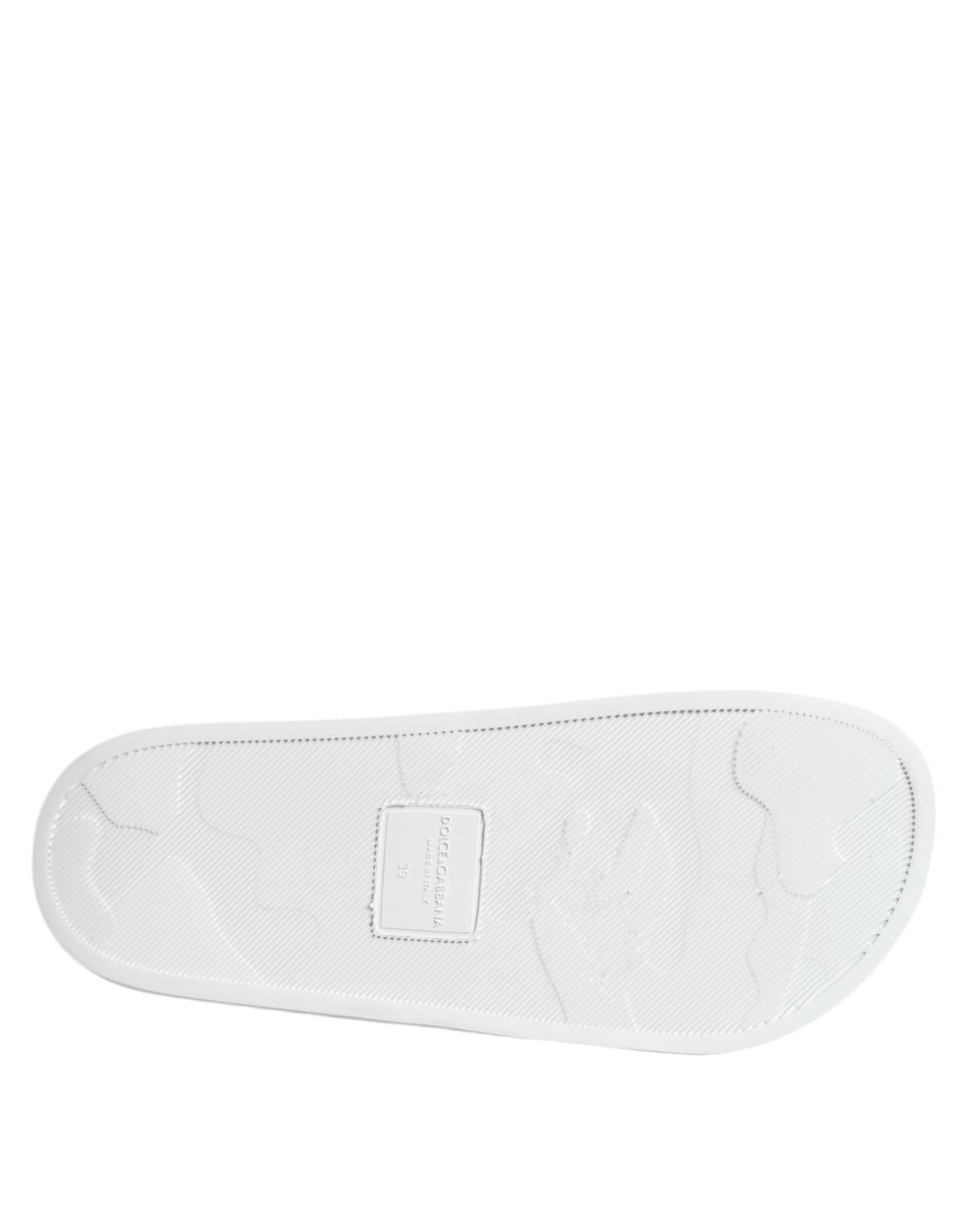 Elevate your summer style with Dolce & Gabbana White Black Leather Sandals, crafted from luxurious calfskin leather, embodying artisanal elegance and timeless sophistication.