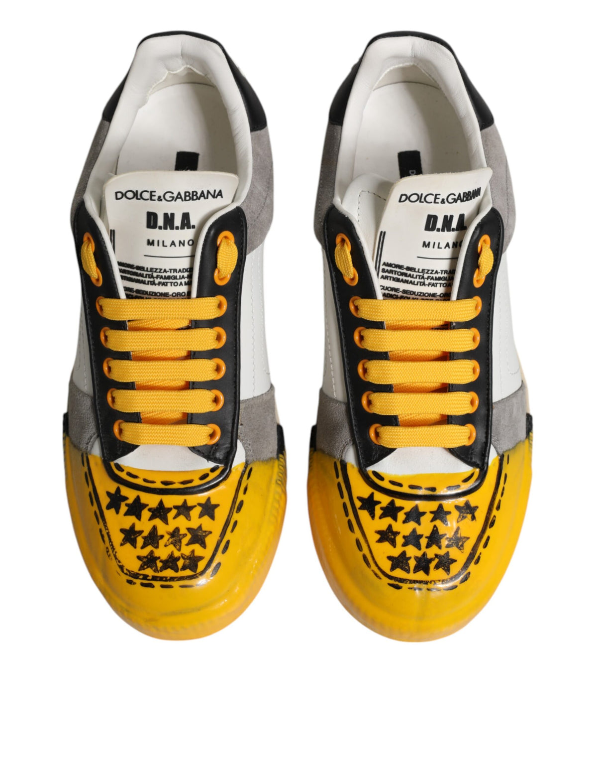 Indulge in the exquisite artistry of Dolce & Gabbana's Multicolor MIAMI Low Top Sneakers, crafted from luxurious calfskin leather for a statement of elegance and sophistication.