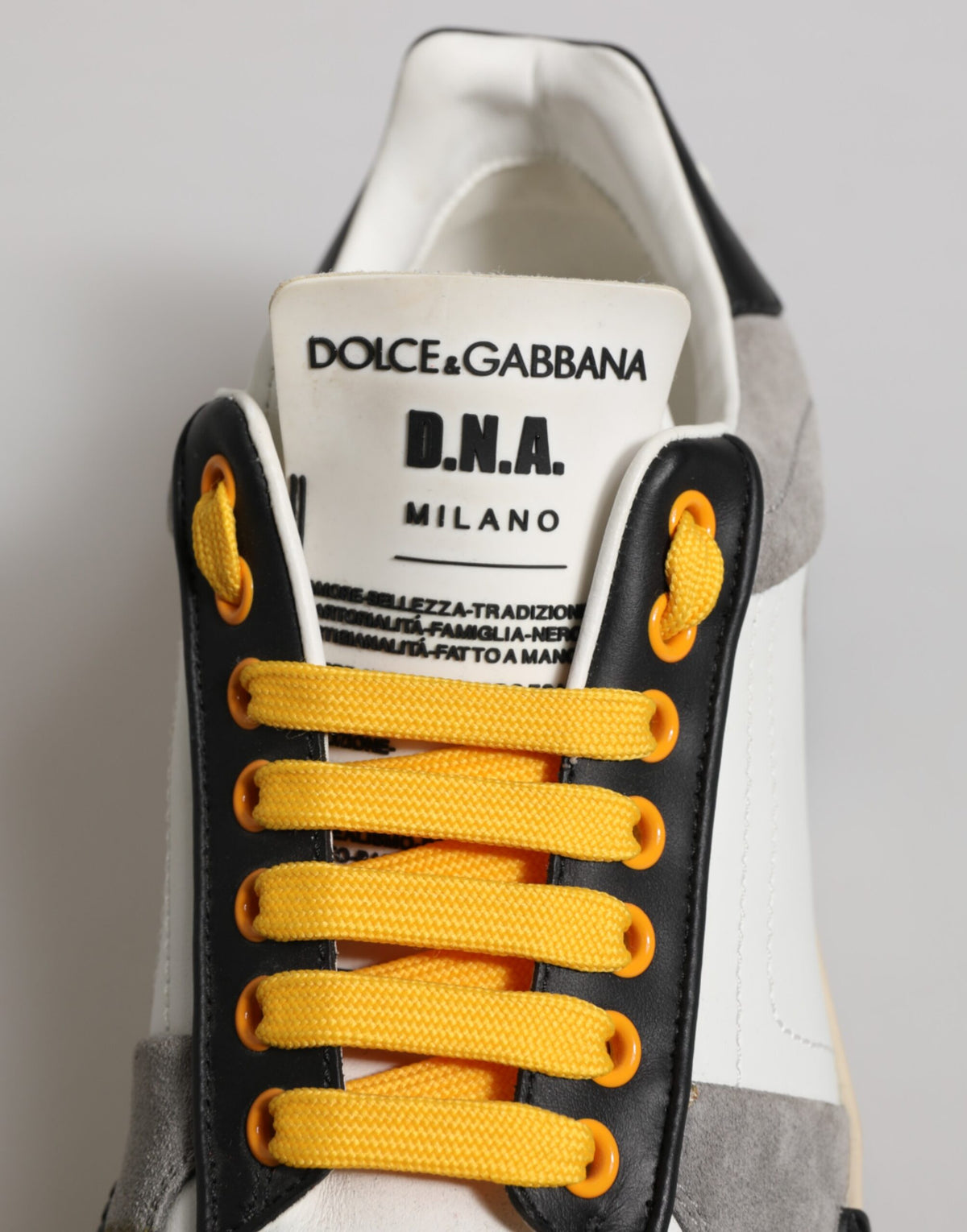 Indulge in the exquisite Dolce & Gabbana Multicolor MIAMI Low Top Sneakers, crafted from luxurious calfskin leather, embodying artistry and sophistication for the discerning individual.