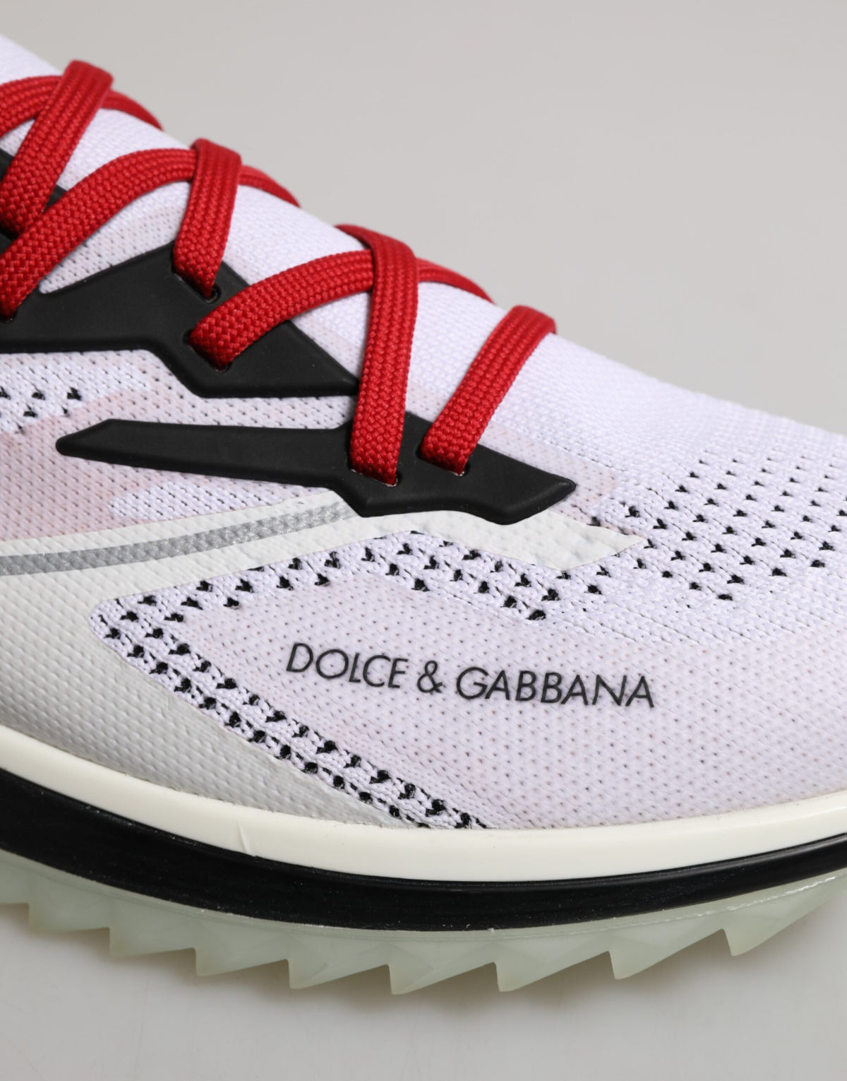 Indulge in the exquisite Dolce & Gabbana White SORRENTO Sport Stretch Sneakers, where luxurious materials and Italian craftsmanship meet effortless style for the discerning individual.