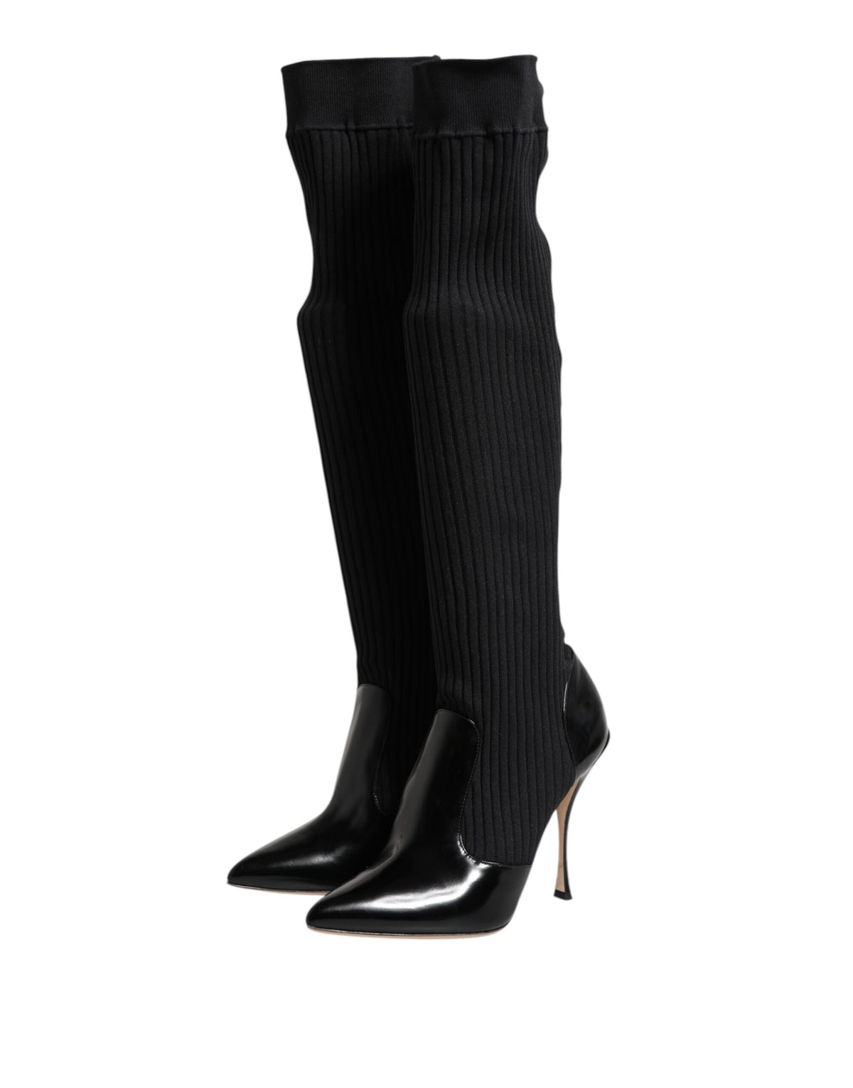 Step into the realm of luxury with Dolce & Gabbana's Black Leather Ribbed Knit Knee Boots, where exquisite Italian craftsmanship meets timeless elegance for the discerning individual.