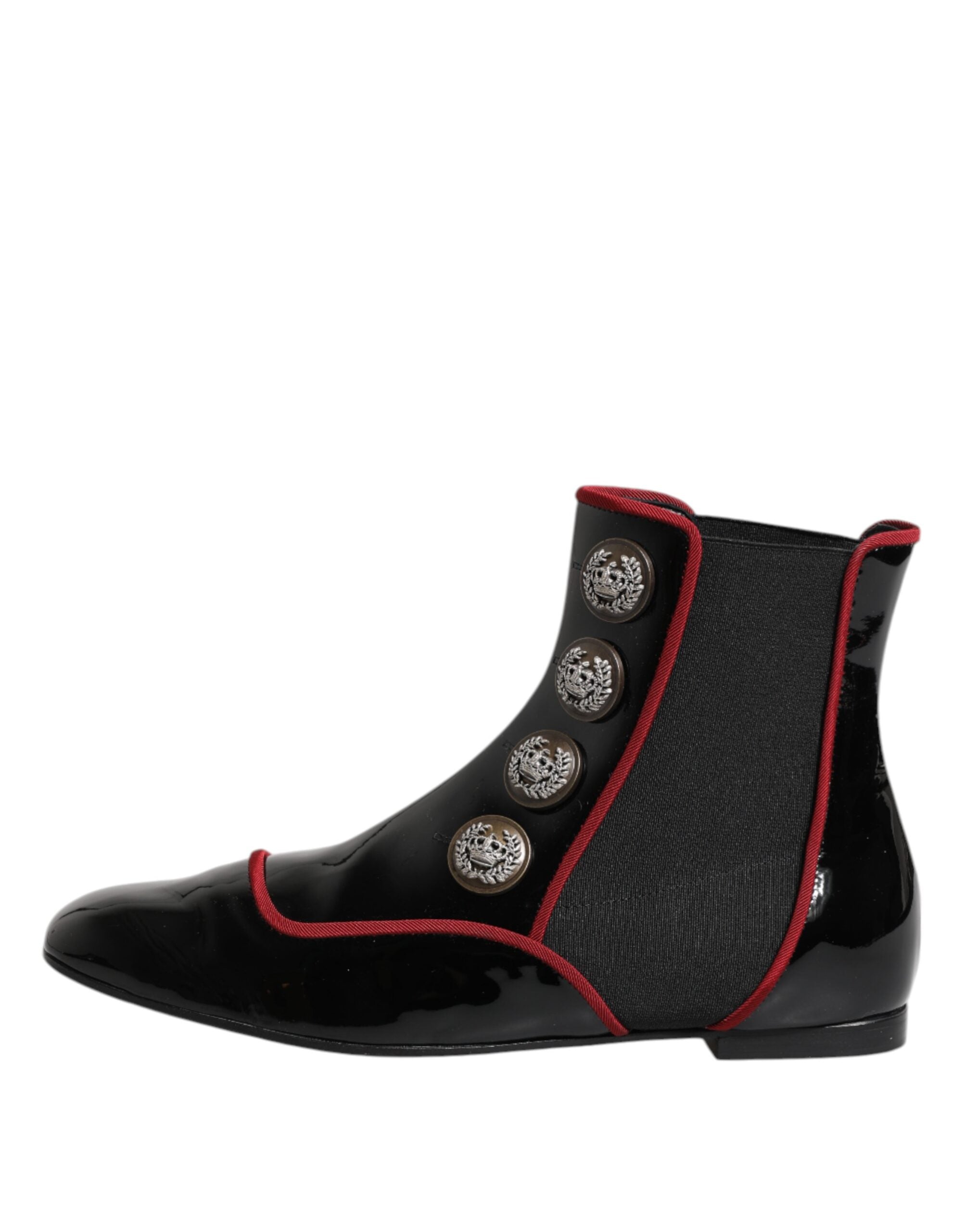 Indulge in the exquisite Dolce & Gabbana Black Jackie Buttoned Chelsea Boots, where artisanal craftsmanship meets luxurious calf leather, elevating your style with timeless elegance.
