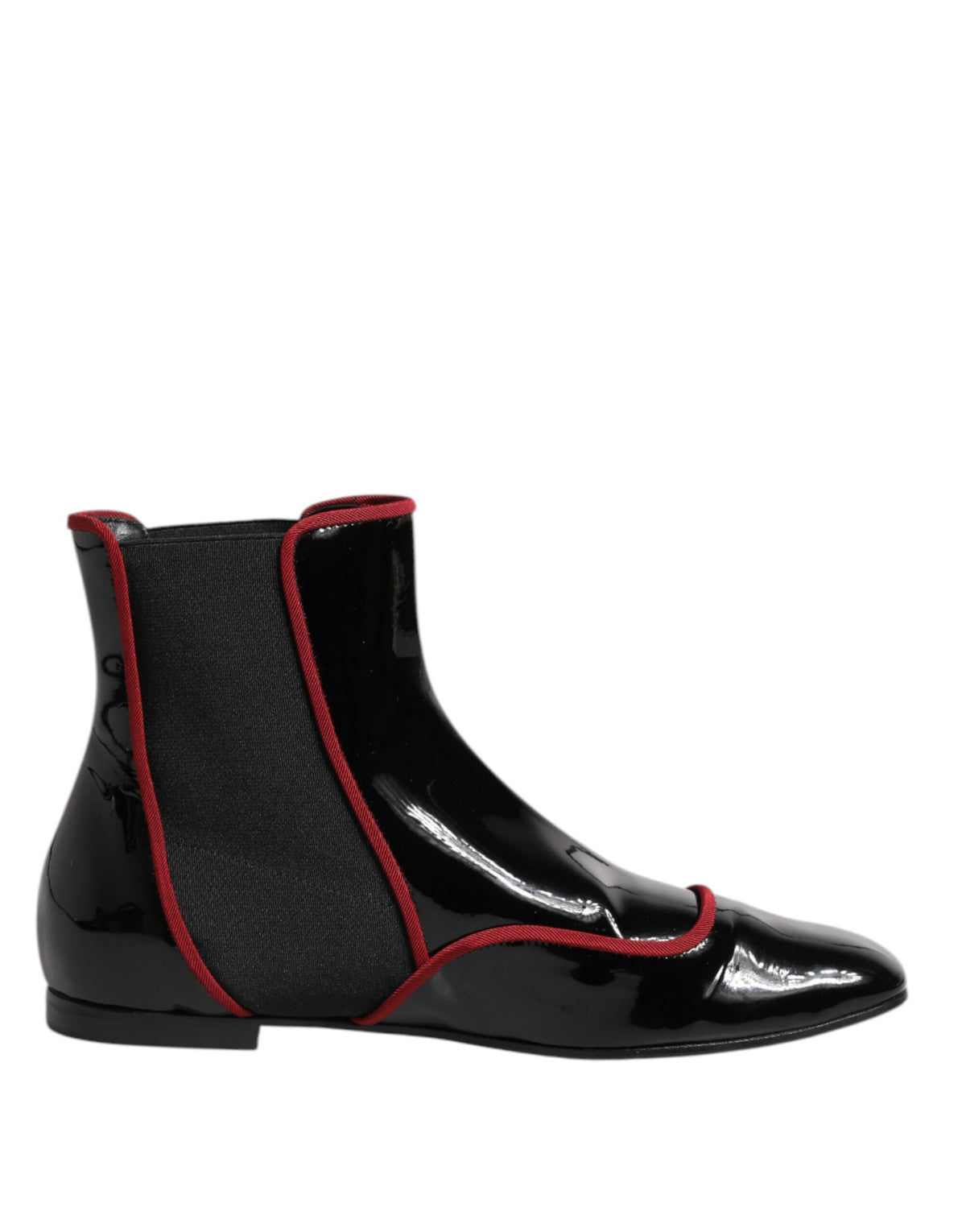 Indulge in the exquisite Dolce & Gabbana Black Jackie Buttoned Chelsea Boots, crafted from luxurious calf leather, embodying timeless elegance and artisanal mastery for the discerning individual.