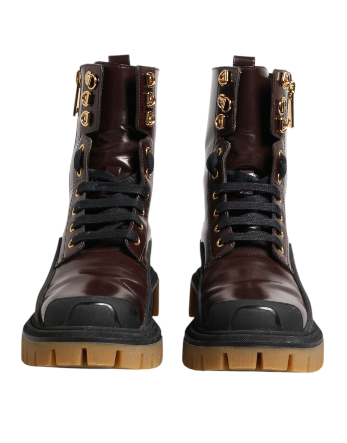 Step into unparalleled elegance with Dolce & Gabbana's Maroon Leather Mid Calf Biker Boots, crafted from premium calf leather for a timeless statement of luxury.