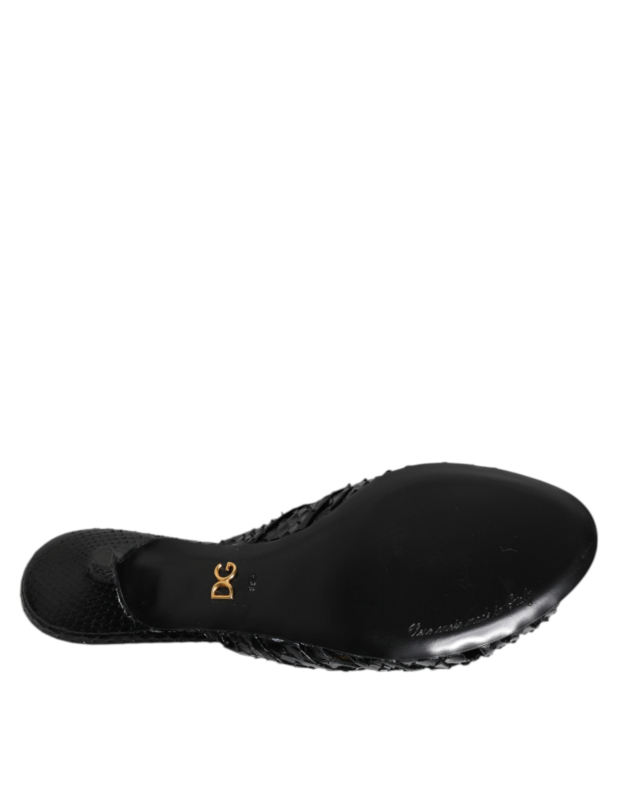 Elevate your style with Dolce & Gabbana's Black Leather Heels Slides, crafted from sumptuous python leather, embodying exquisite Italian artistry and timeless elegance.
